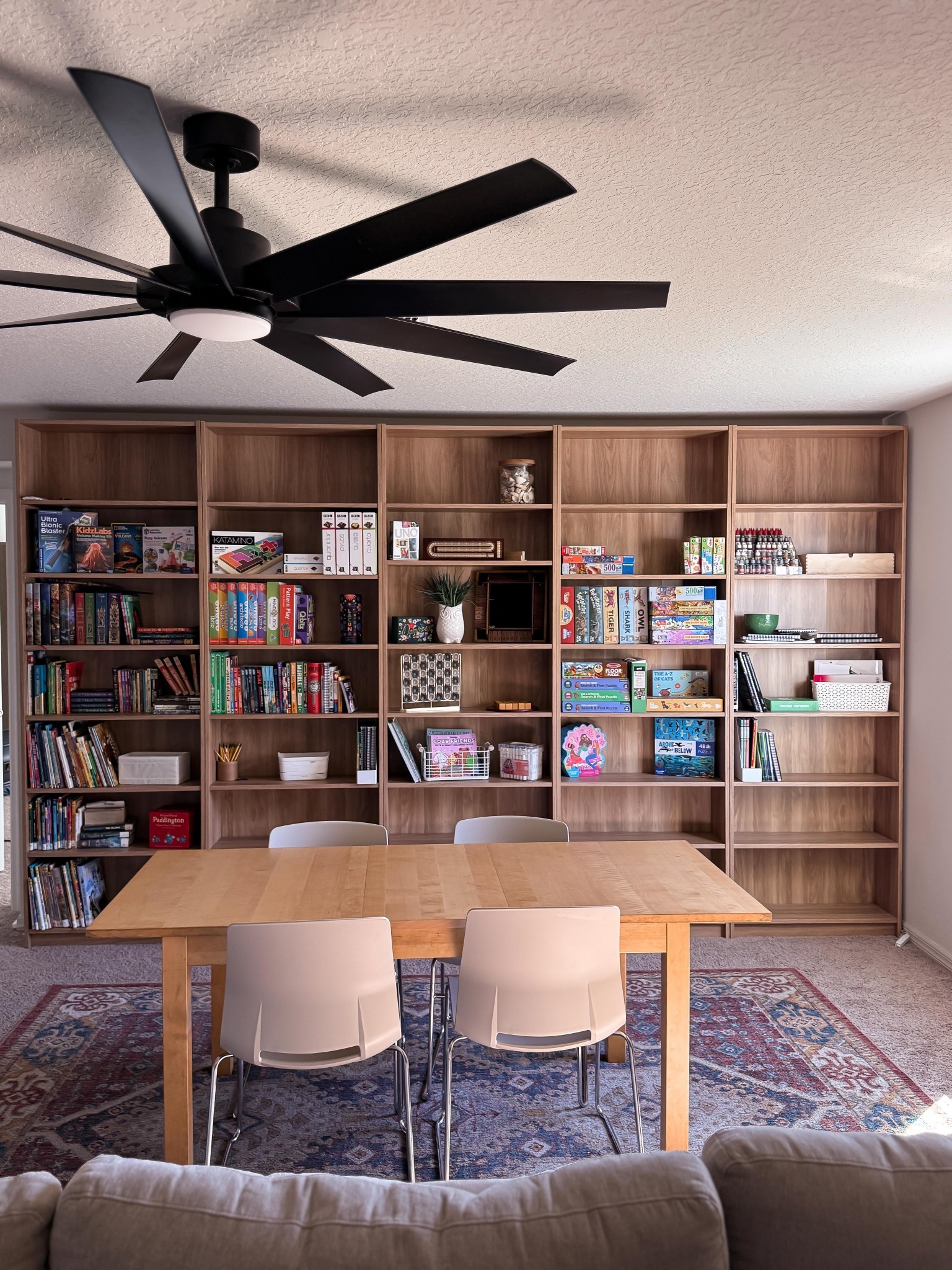 Making a space our family loves to hang out in has been so good for our daily life. Kids love to come up here and read, craft, relax, and play games. 

Library room. Game room. Cozy home. 

#LTKHome