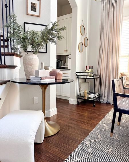 Dining room - round marble black tulip table

#LTKhome