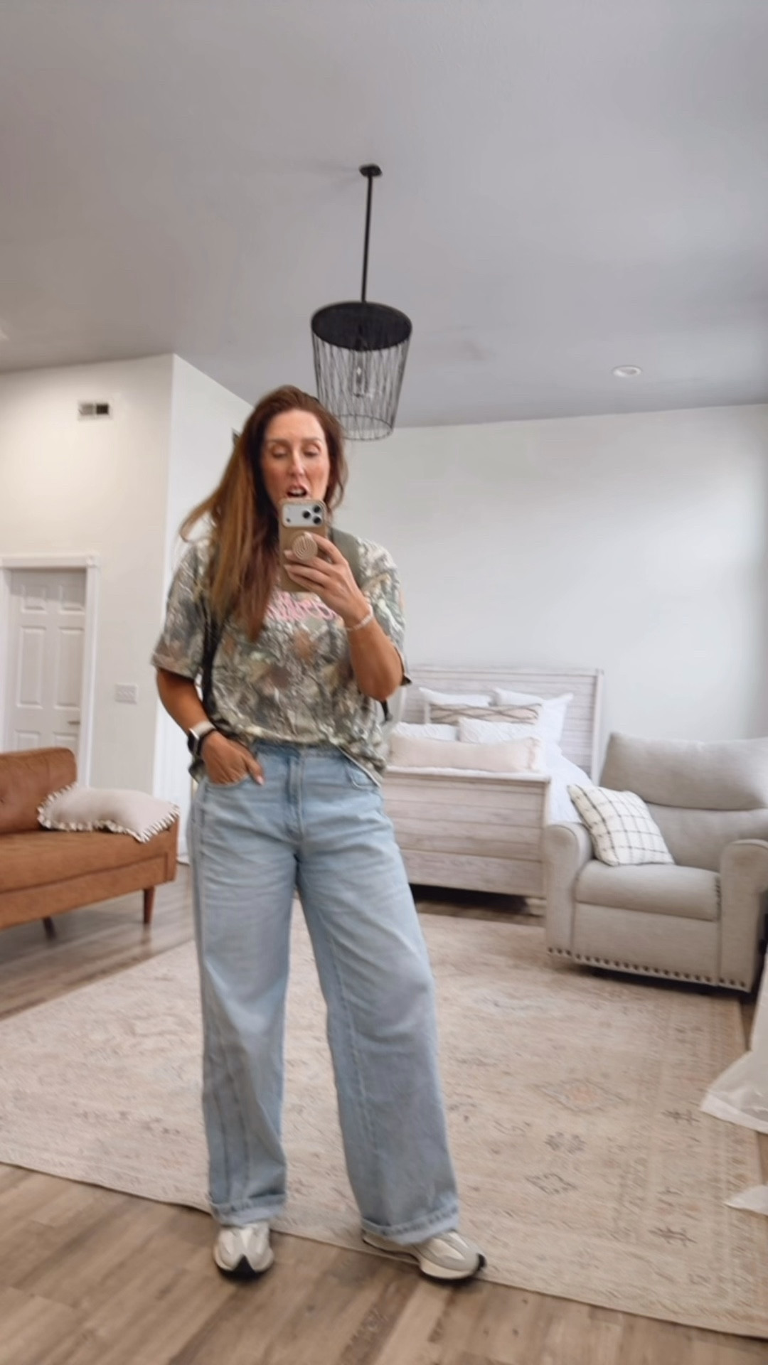 This weekend was all about bball until it was time to go to work.
For my first outdoor session of the year I opted for jeans since it’s chilly- the Kris wide legs are a staple for me now. Combined with a trendy light camo t and New Balance sneakers!

#LTKMidsize #LTKTall #LTKootd