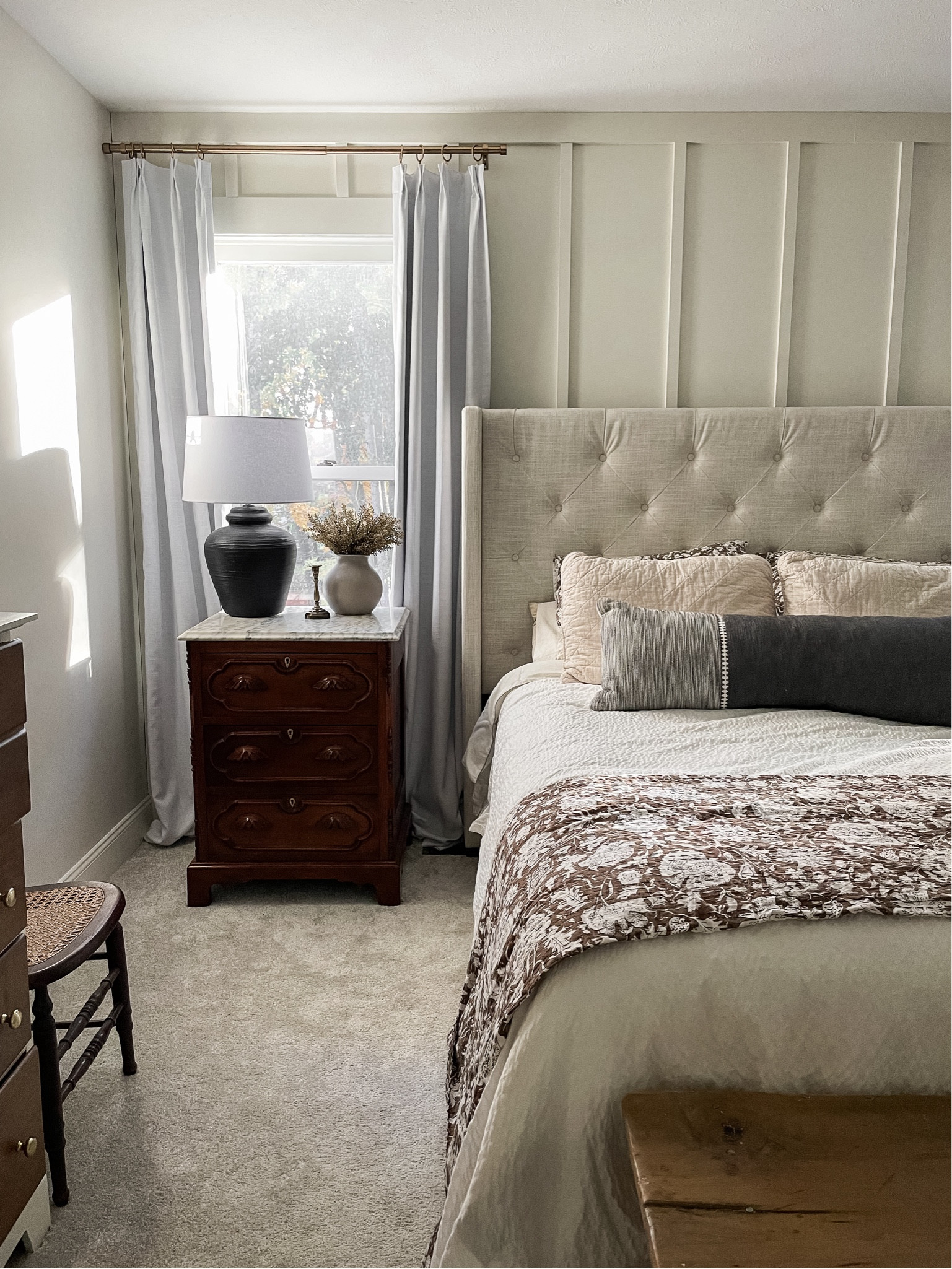 Our winter bedroom.  

Upholstered bed frame.  Neutral bedding.  Black table lamp.  

#LTKHome #LTKSeasonal