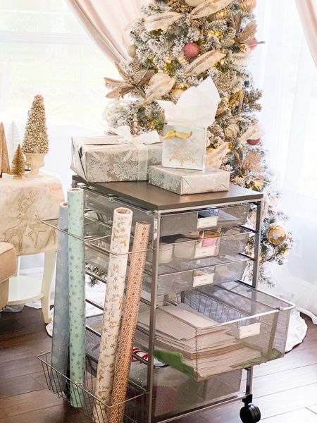 Wrapping paper station and organization! The stress free way to wrap gifts and store away when you are done. #organization #wrappingstation #wrappingpaper #christmaswrapping #organizedholiday #organizedlife 

#LTKhome #LTKHoliday #LTKSeasonal