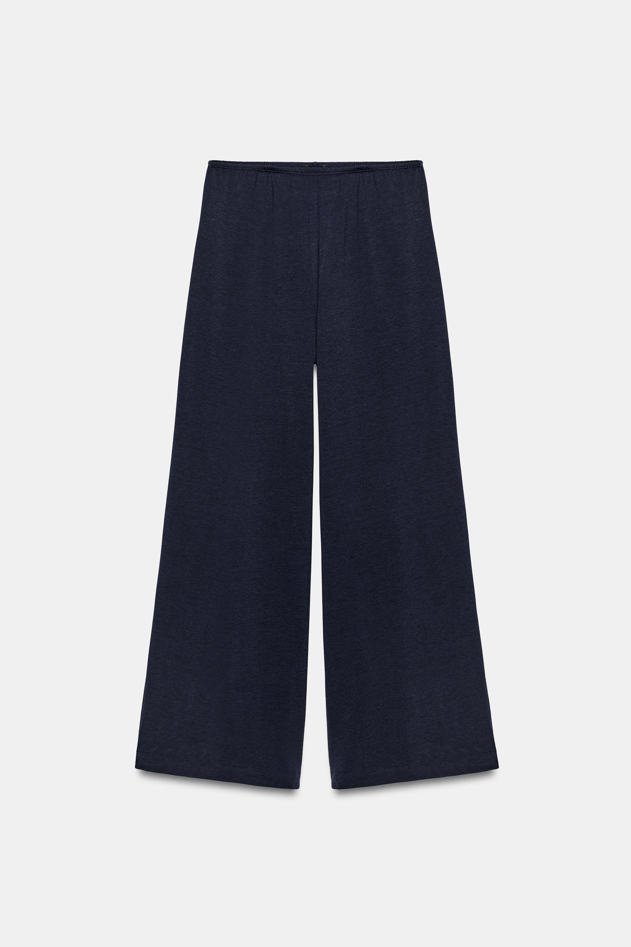 Model height: 179 cmTrousers made from a 33% cotton blend. Mid-waist with an elasticated waistban... | Zara UK
