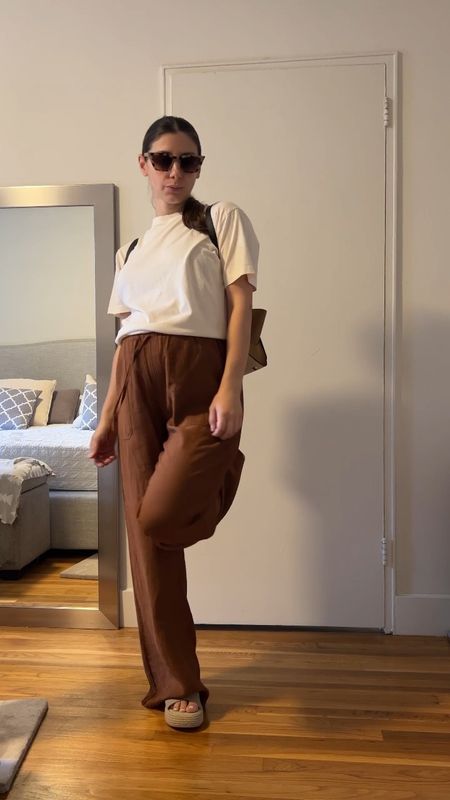 Neutral outfit wide leg pants with white shirt backpack weekend outfit bump friendly 

#LTKstyletip #LTKbump #LTKSeasonal