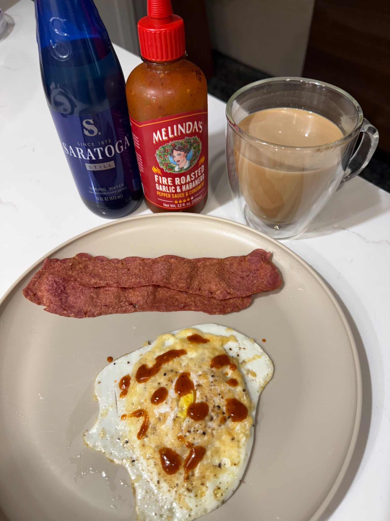 All less than 250 calories. 16 grams of protein. Did you know adding sauces, dressings, ot condiments to your healthy choices can make them no longer good choices. They often add significant, hidden calories. This sauce is 0 calories!

Turkey bacon is a much healthier option than regular bacon. You still get protein but  it has way less calories and fat. 

Coffee with cream is my morning indulgence but I never add sugar, flavoring, or sweetener of any kind.  I aldo drink my water and eat my breakfast first  

Always drink at least 16 ounces of water in the morning. It helps hydrate your body and boosts your metabolism  

#LTKvlog #LTKfitnessgoals #LTKfoodie