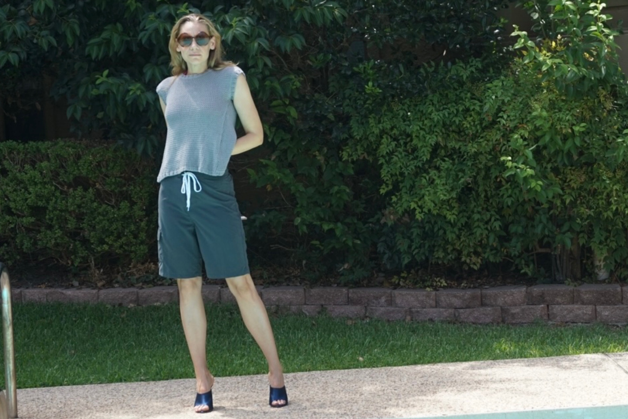 It’s too hot to do anything but stand by the pool - so I stole his board shorts and tried to make it fashion #investmentpiece 

#LTKSeasonal #LTKshoecrush #LTKswim