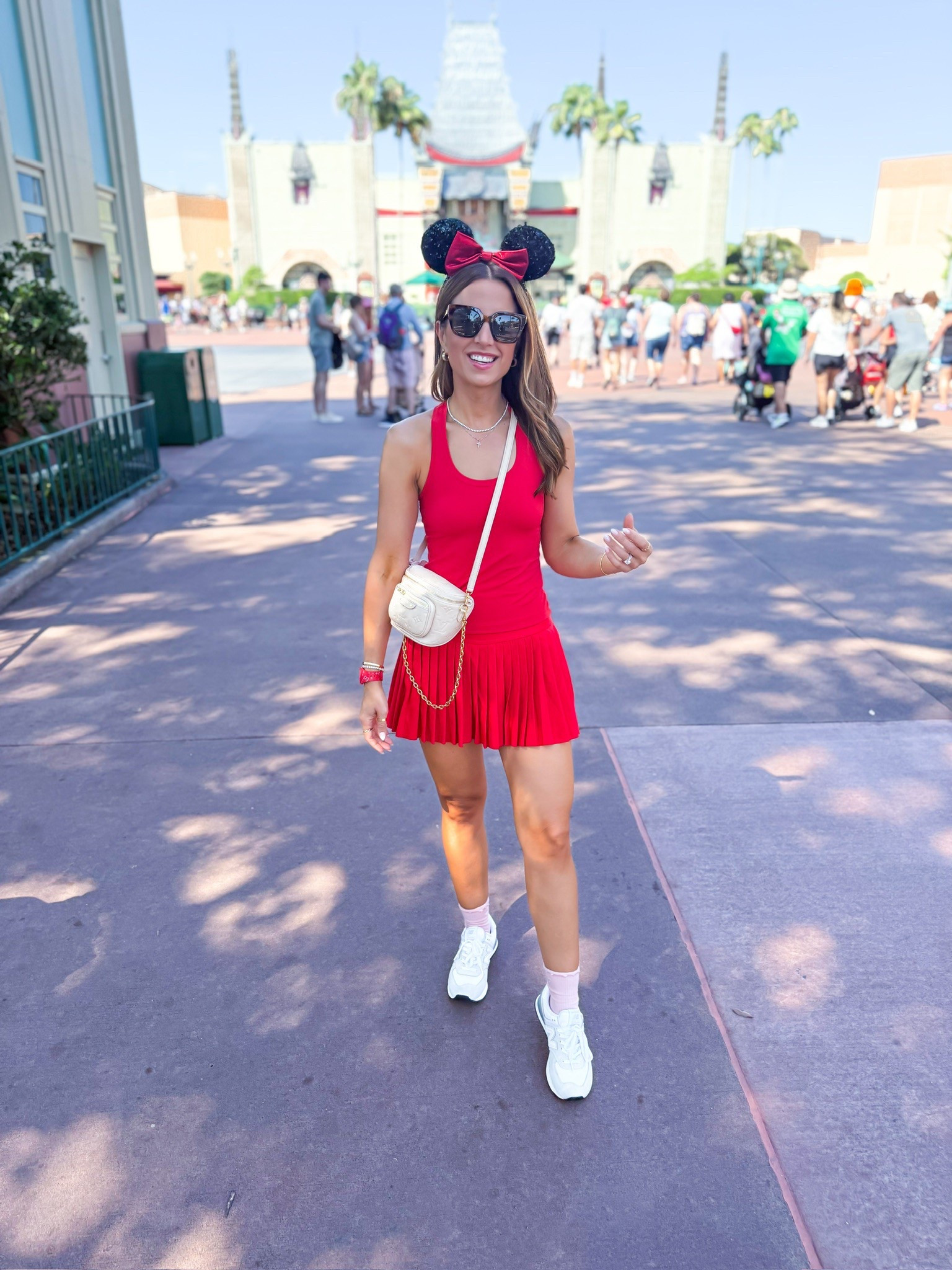 Disney outfit. Hollywood studios outfit. Amazon athletic skirt in XXS. Amazon tank top in XXS. New Balance 574 are tts and so comfy for all day! Amazon activewear. Mom outfit. Casual outfit. Theme party outfit. LV mini bum bag in color sand. 


#LTKShoeCrush #LTKActive #LTKTravel