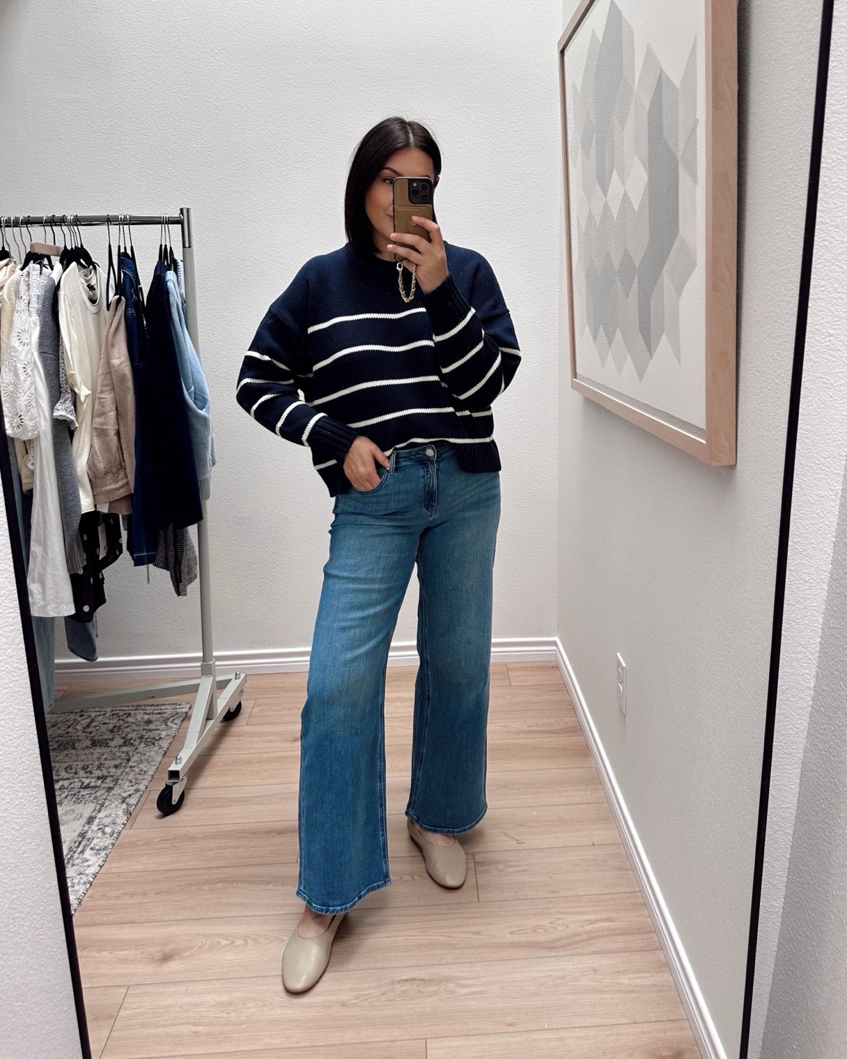 This is one of my favorite sweaters from Quince! I have it in two solid colors and this stripe! I love them all equally. I like to size up in this sweater for a very oversized fit, but it runs true to size in a relaxed fit. It’s not a fitted sweater at all. This is the large and it fits oversized. I have it in the medium in a white color and I like that size / shape for a less casual look.   

I'm in the 30 of the jeans, true to size.  

 