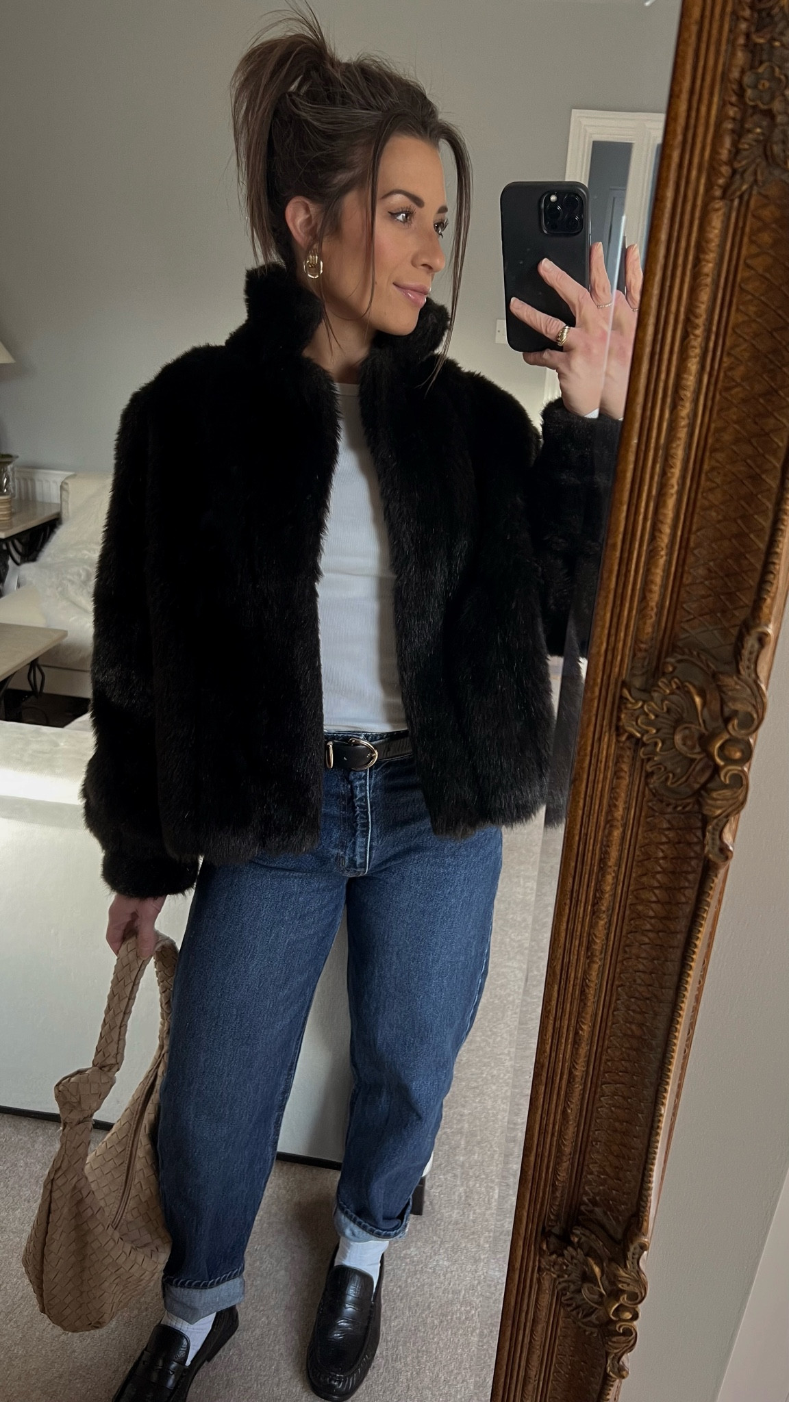 Winter outfit. Baggy tapered cuffed jeans. Dark denim. Black loafers. Relaxed loafers. Leather loafers. Woven shoulder bag. Faux fur jacket. European style. Weekend style. What to wear. How to wear. How to style. 

#LTKFindsUnder100 #LTKPetite #LTKSeasonal