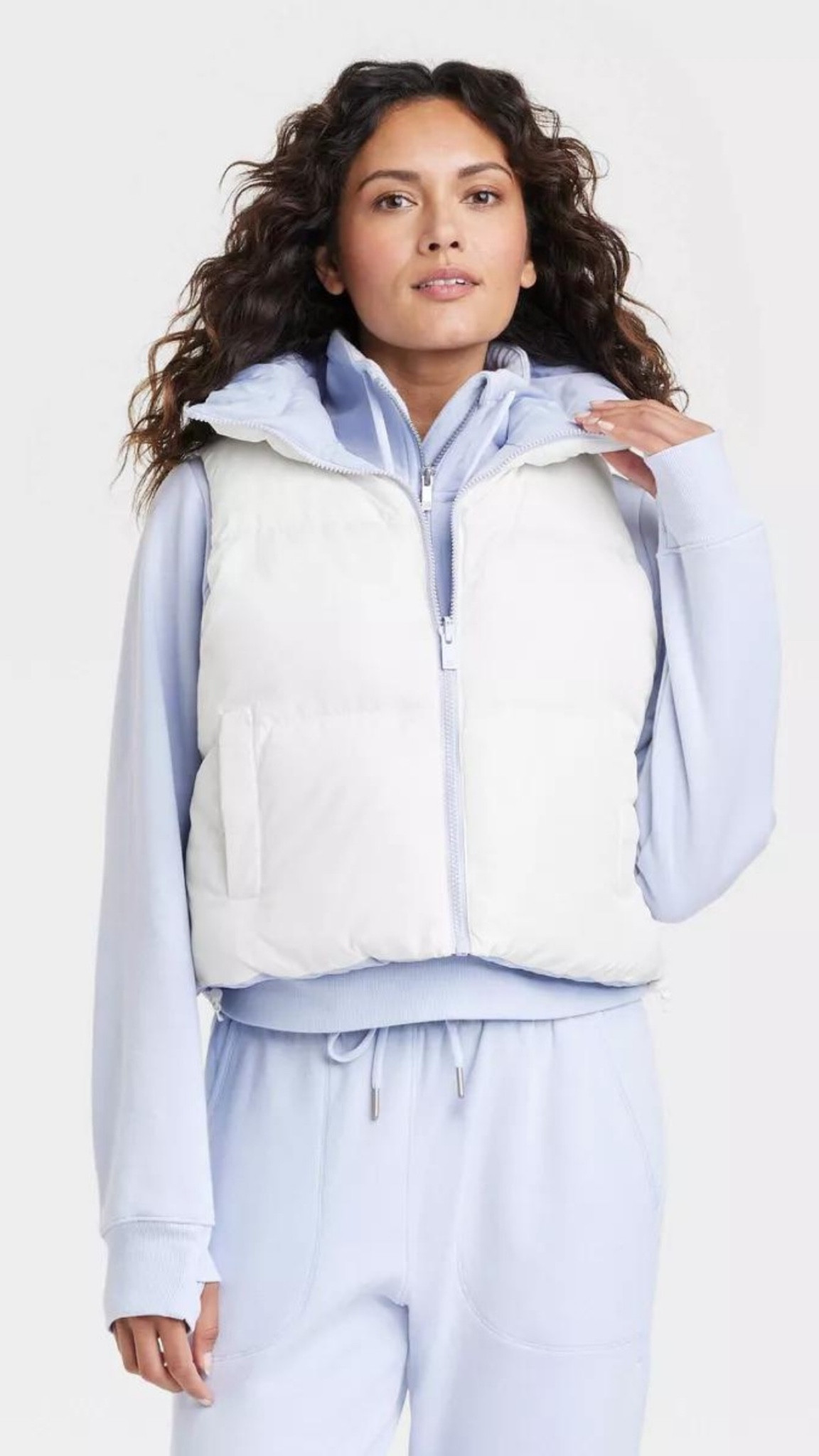 A cute and easy athleisure matching outfit- super easy to mix and match but this lavender color is so pretty! Sweatshirt and joggers are $25 each which is a steal and the vest is reversible so a 2 for 1 at $40. The sweat set also comes in so many different colors!

#LTKstyletip #LTKfindsunder100 #LTKtravel