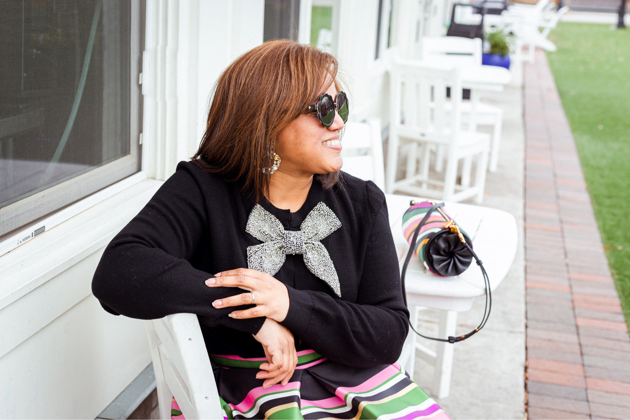 Put a bow on it!  I LOVEEE this sweater!  And, I love it paired with stripes. I sized up from an XL to an XXL in the sweater; the skirt fits TTS. 

I hope that you had the best Christmas (if you celebrate)!  We had the best Christmas; we did a staycation at one of our favorite ATL hotels and we had Christmas Brunch at one of our favorite restaurants. It was the perfect day spent with my favorite person! 🎀🎀