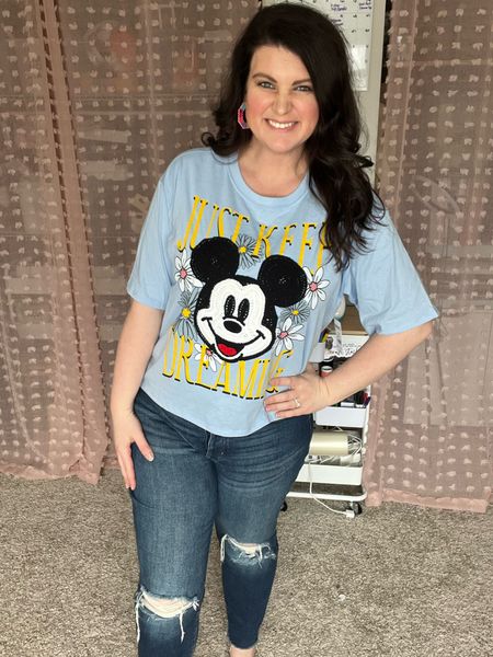 Such a fun spring Walmart top! I love this Disney graphic tee. It’s originally cropped so I sized up to a 2XL so I was covered. The Mickey head is crocheted and super cute! Walmart finds, Walmart tops, Walmart spring, Disney world outfit, Disney vacation, 

#LTKFind #LTKfit #LTKtravel