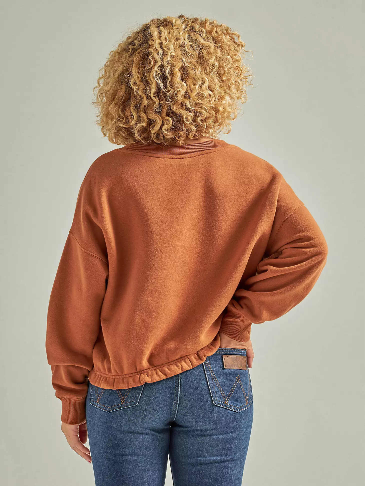 Women's Wrangler Long Live Cowboys Cinched Fleece Pullover in Argan Oil | Wrangler