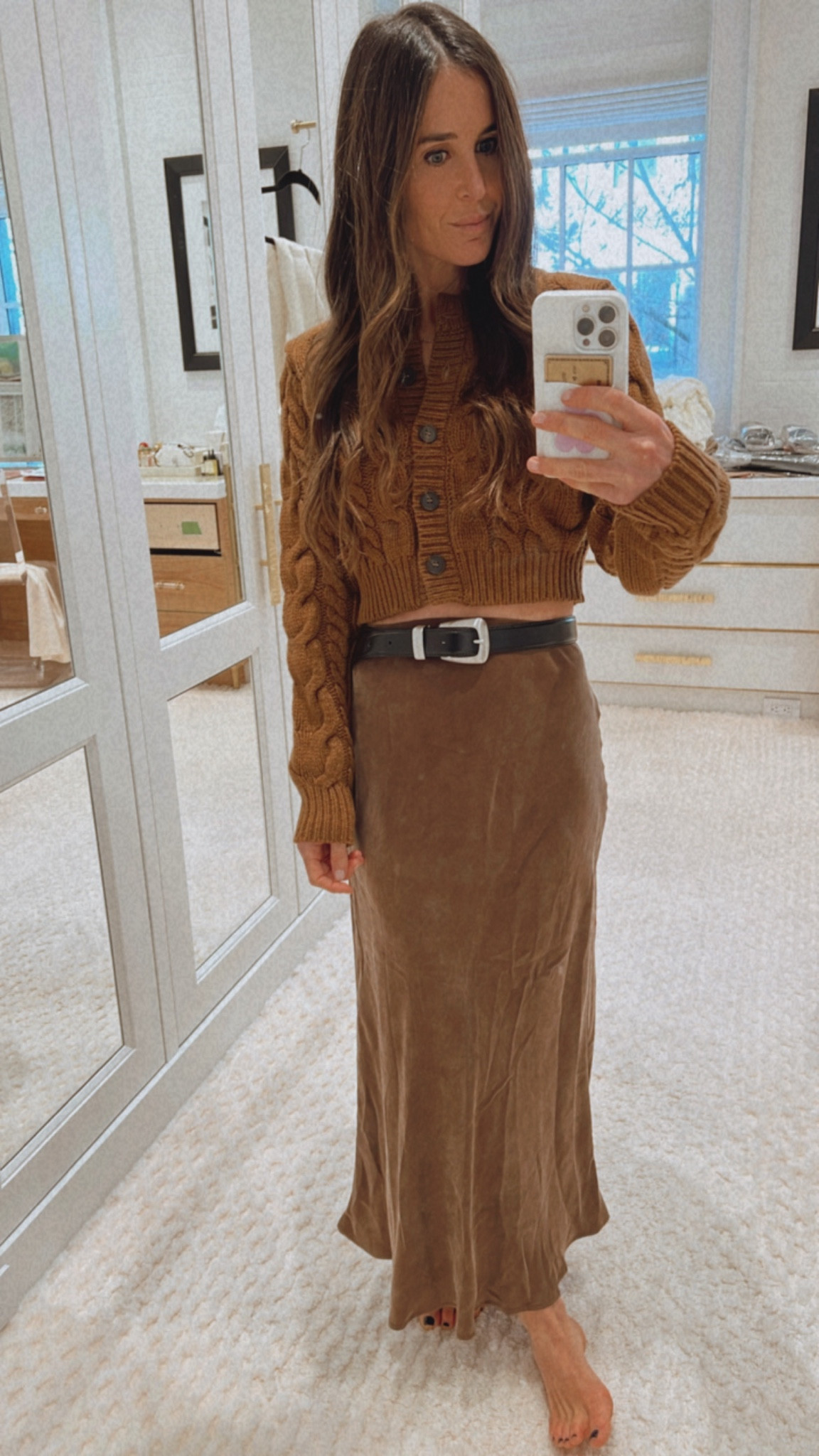 Brown cable knit sweater from FRAME with this brown midi skirt!

#LTKstyletip #LTKFind