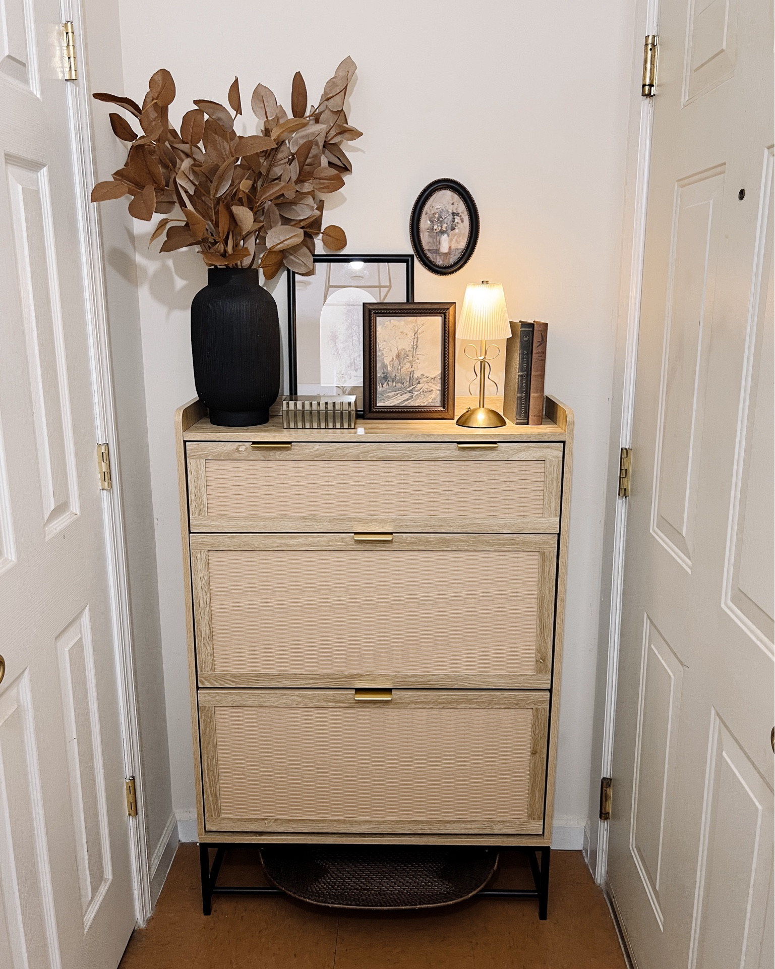 I’m obsessed with my new shoe cabinet! It holds up to 20 pairs and fits perfectly in my small, narrow space. I love decorating the top shelf, and the extra storage drawer is a game-changer. No more shoe mess! 
#wayfairpartner #wayfair #ltk #ltkfinds #liketkit #liketoknow.it #entryway #entrywaystyling #shoecabinet #shoeorganizer #shoeorganization 

#LTKHome #LTKSaleAlert #LTKxWayfair