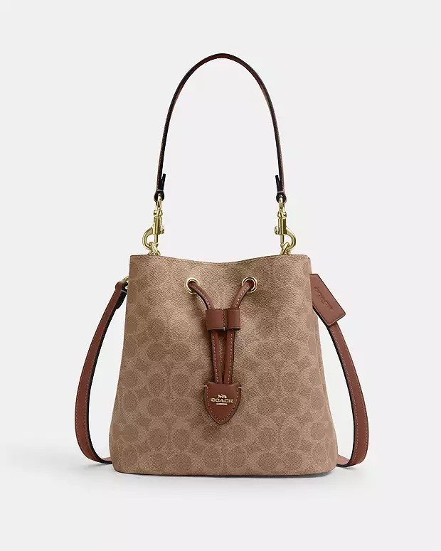 Rowan Bucket Bag In Signature CanvasRating4.7C$249(49% off)Comparable ValueC$490Color: Gold/Tan/B... | Coach Outlet CA