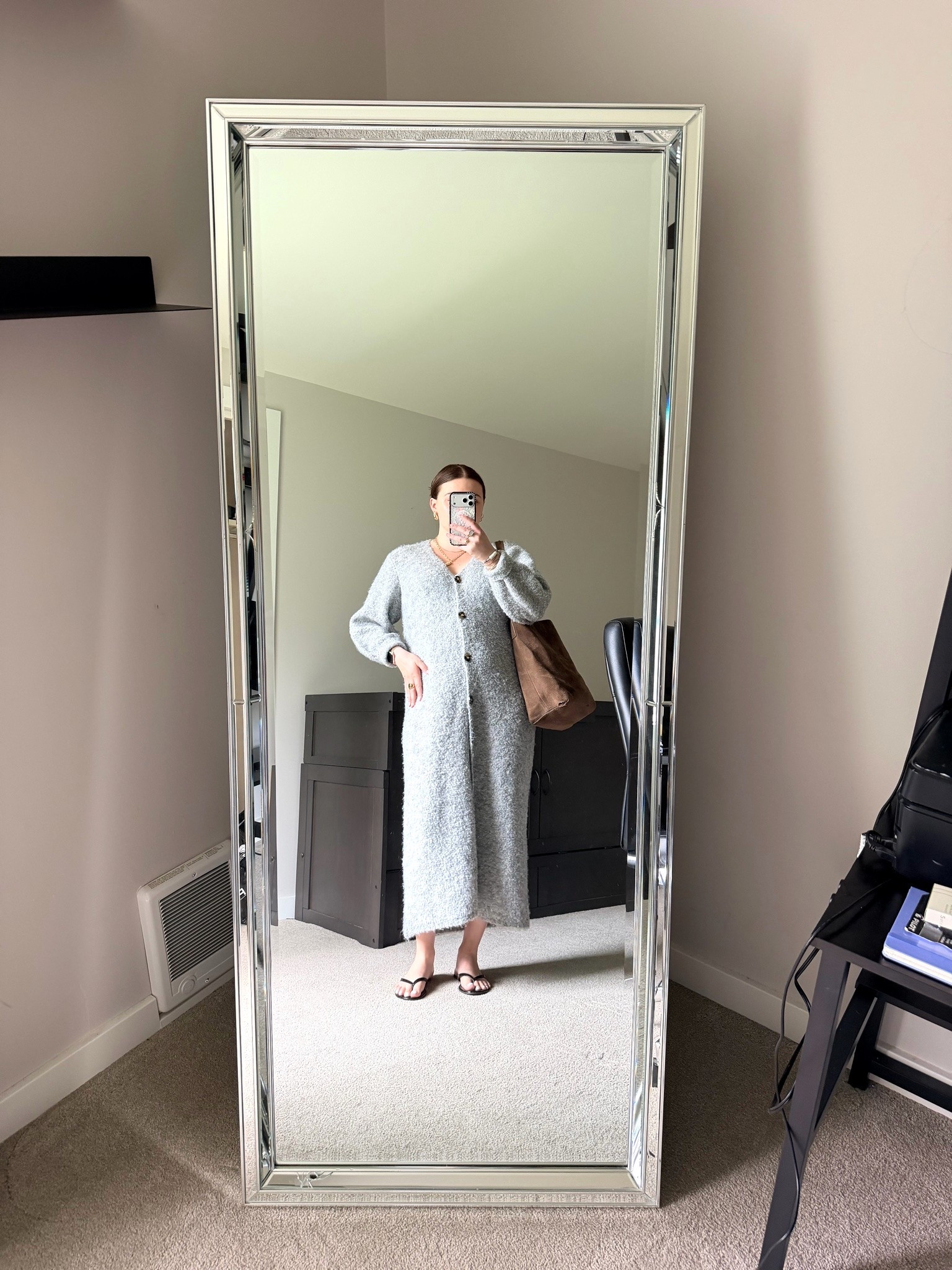 First work day in the new place! Decided it was the perfect time to get cozy in my fave sweater dress 🩶

I’m wearing a L dress and size 9 sandals

#LTKootd #LTKMidsize #LTKWorkwear