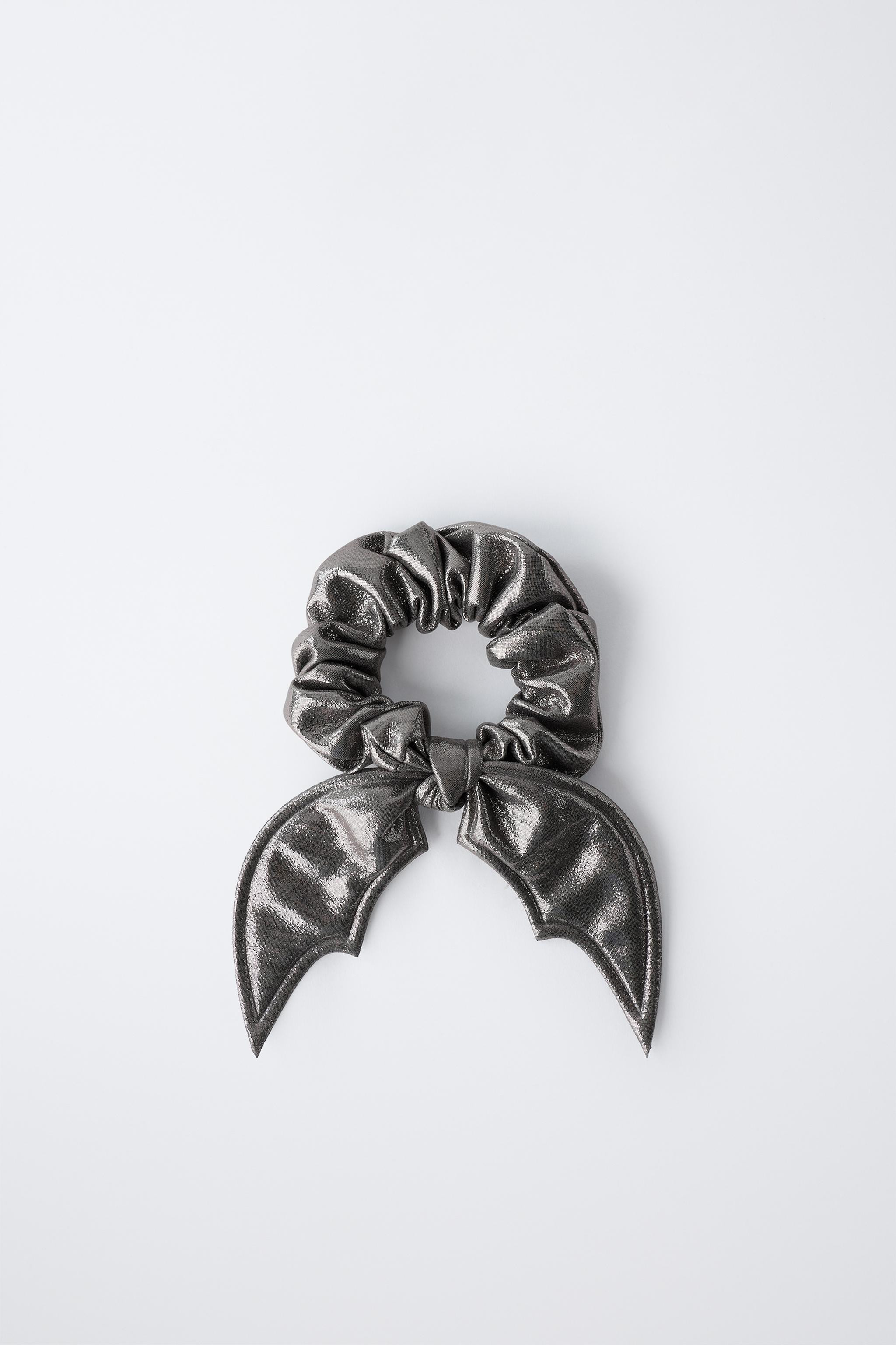 NEWSPARKLY BAT WING HAIR TIE$ 9.90Dark silver | 2326/540/836Add to cartAddElastic hair tie with b... | Zara US