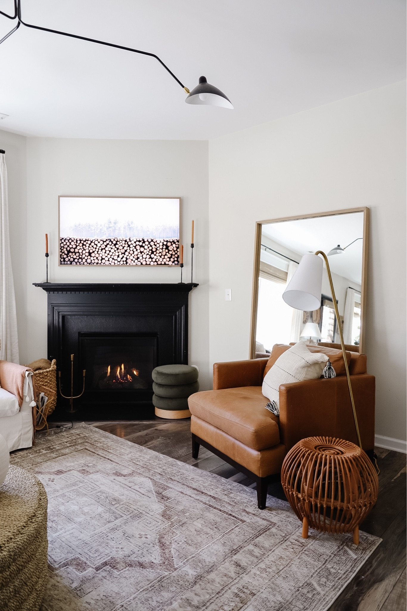 Living room, green ottoman, leather chair, brown vintage inspired washable rug 

#LTKhome