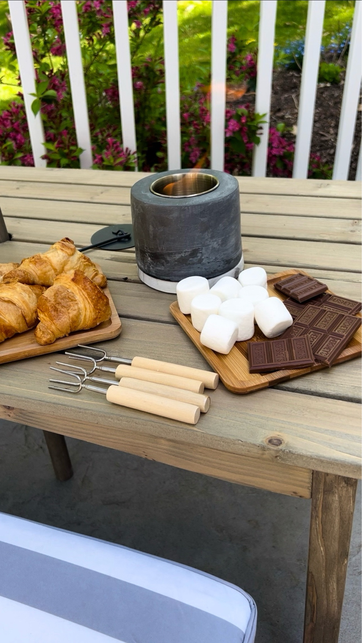 Perfect set up on my kids picnic table to make s’mores. Easy clean up with the portable smokeless fire pit 

#LTKFamily #LTKHome #LTKSeasonal