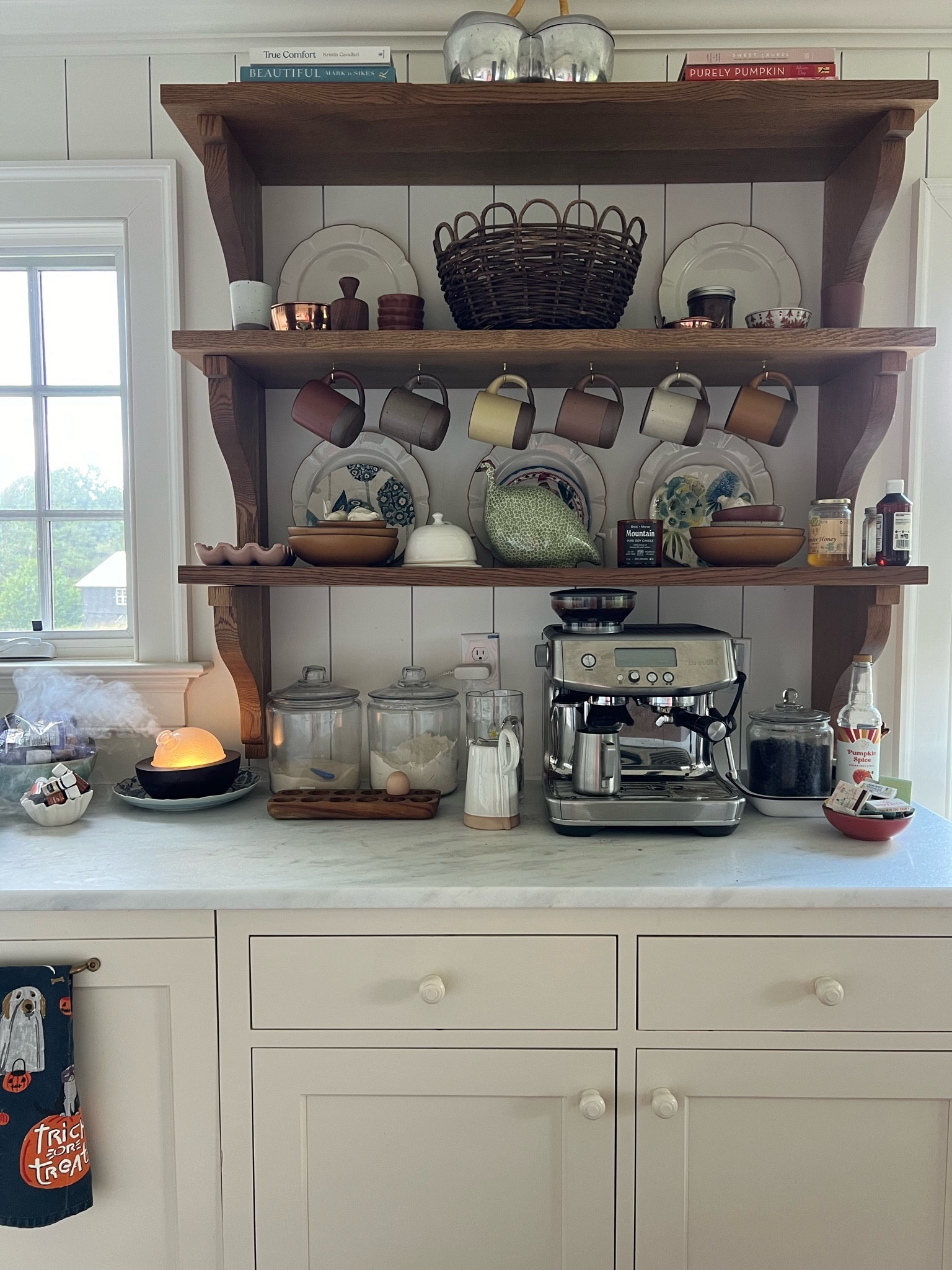 Autumnal coffee shelves coffee mugs espresso machine ceramic bowls Halloween dish cloth#LTKover40 #LTKhome

#LTKSeasonal