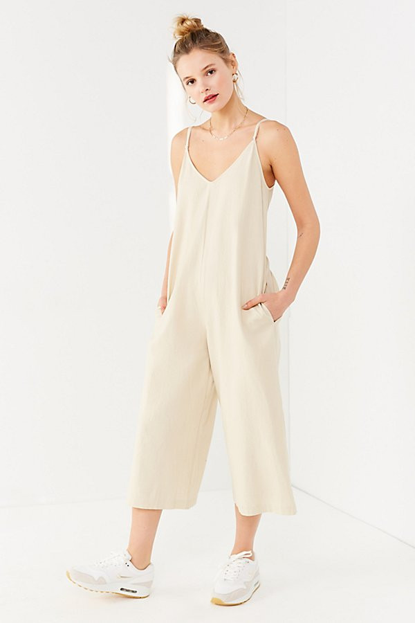 UO Shapeless Linen V-Neck Jumpsuit - Beige XS at Urban Outfitters | Urban Outfitters (US and RoW)