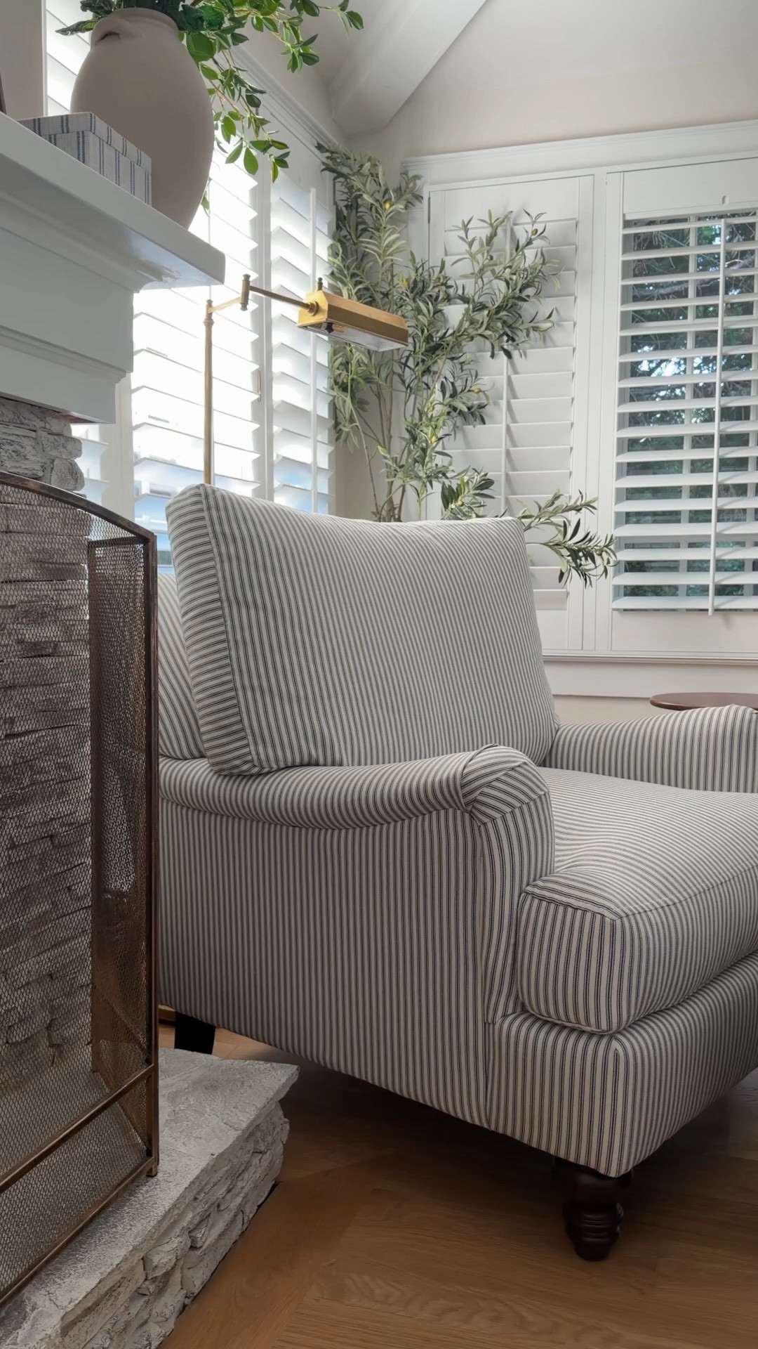 The striped chair of my dreams, and officially the piece that made this corner. Oversized in the best way, with plenty of room to curl up solo or cuddle in with my toddler (which is usually how you’ll find us).

And the new side table? The shape, the warm wood, the little bit of character it brings next to the stripe…it just works.

Both from @birchlane, bringing that collected, lived-in feeling I’m always after.  Comment SHOP for links to the entire space! 

#birchlanepartner #mybirchlane #birchlane