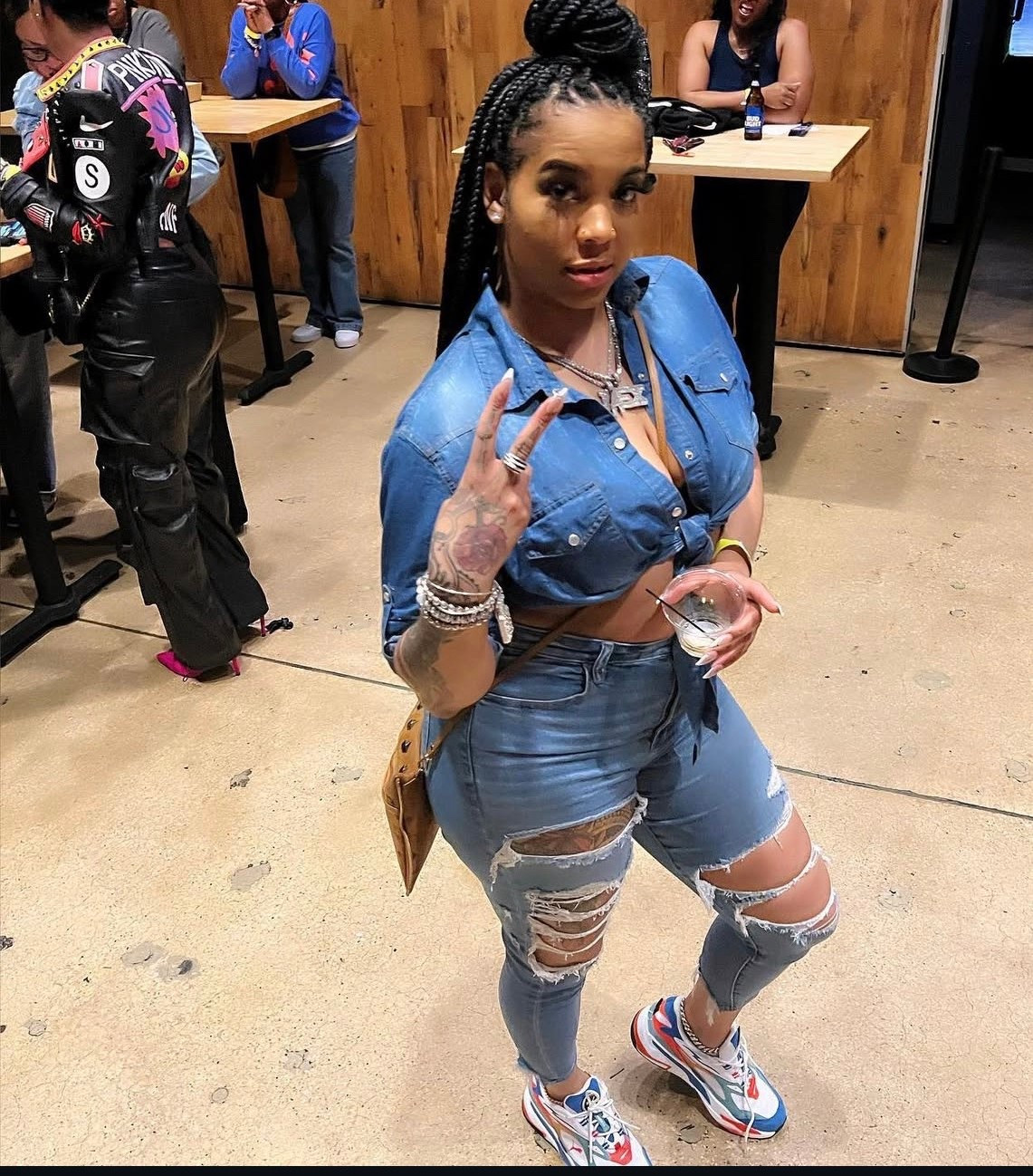 Denim done right for a night out. A cropped denim top with distressed jeans, bold sneakers, and statement jewelry to finish the look.

#LTKdenim #LTKstyle #LTKootd
