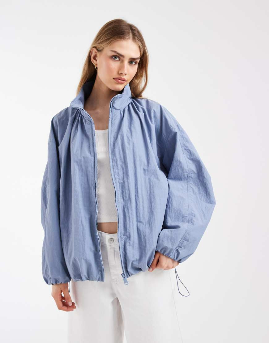 ASOS DESIGN oversized bubble hem track jacket in blue-Neutral | ASOS (Global)