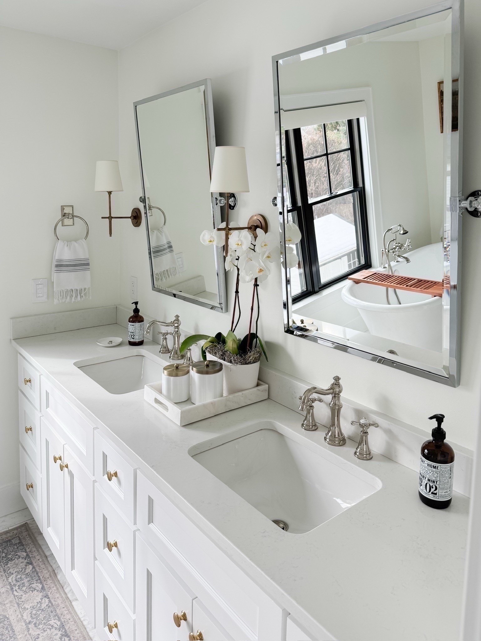 Shop my spa like white brass and marble bathroom. I am linking similar marble from Wayfair. My vanity was custom, but I am linking similar one. I used to mix metals in the space with polished nickel plumbing and brass sconces and knobs. My vintage style runner is washable and I’ve had it for almost 5 years now.


#LTKHome #LTKmomlife