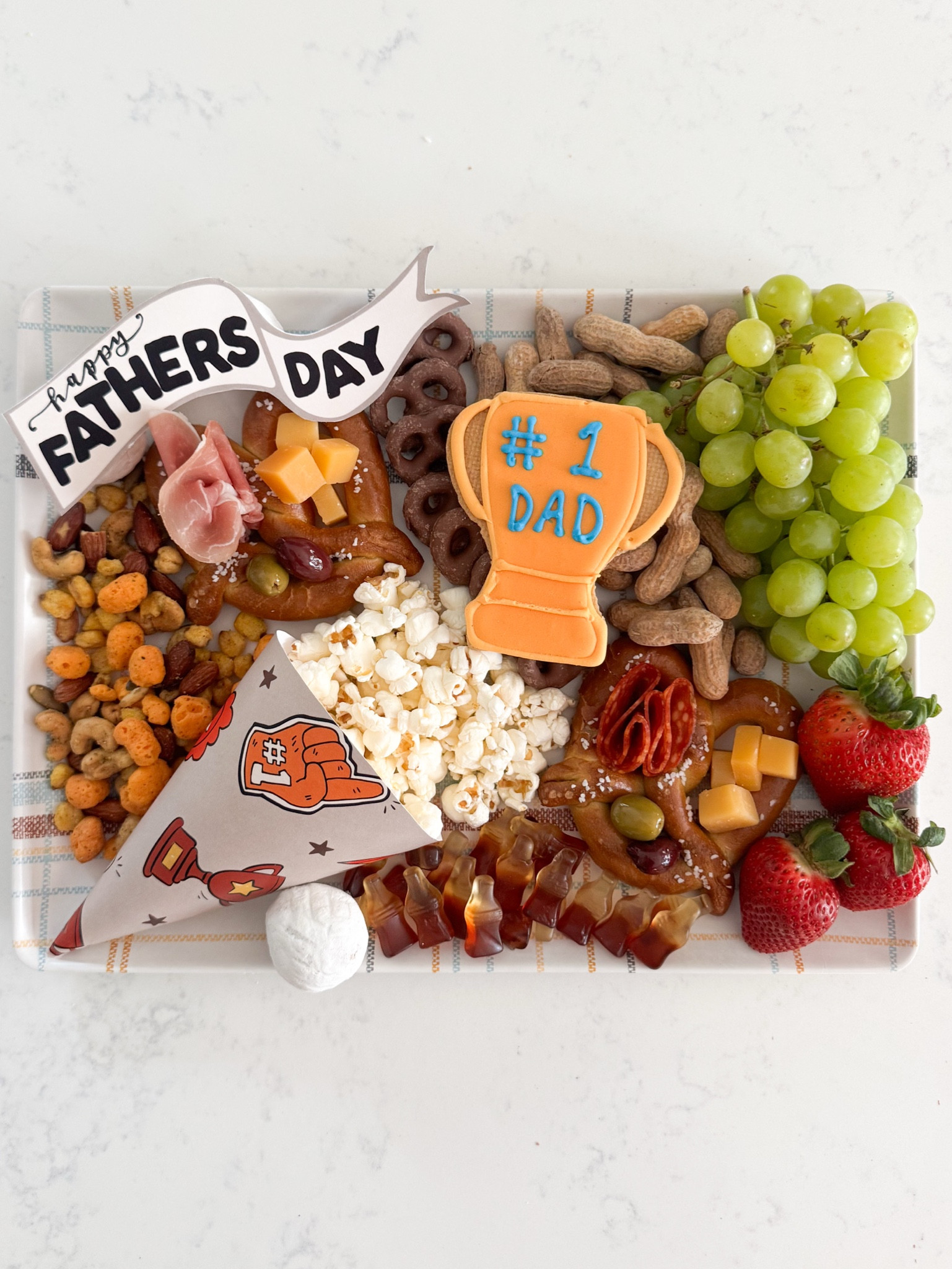 The Ultimate Dad Board 🏆🥨🥜

Charcuterie, pretzel charcuterie, Father’s Day, grazing board 

#LTKParties #LTKMens #LTKFindsUnder50