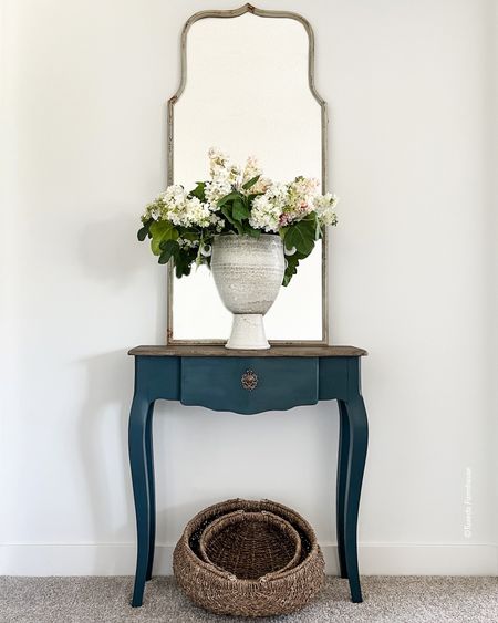 Dress up a corner or hallway with a small console table, a large vase of flowers and a tall mirror. Add a basket or small pouf stool under the table. 

Home decor, hallway decor

#LTKhome #LTKstyletip #LTKFind