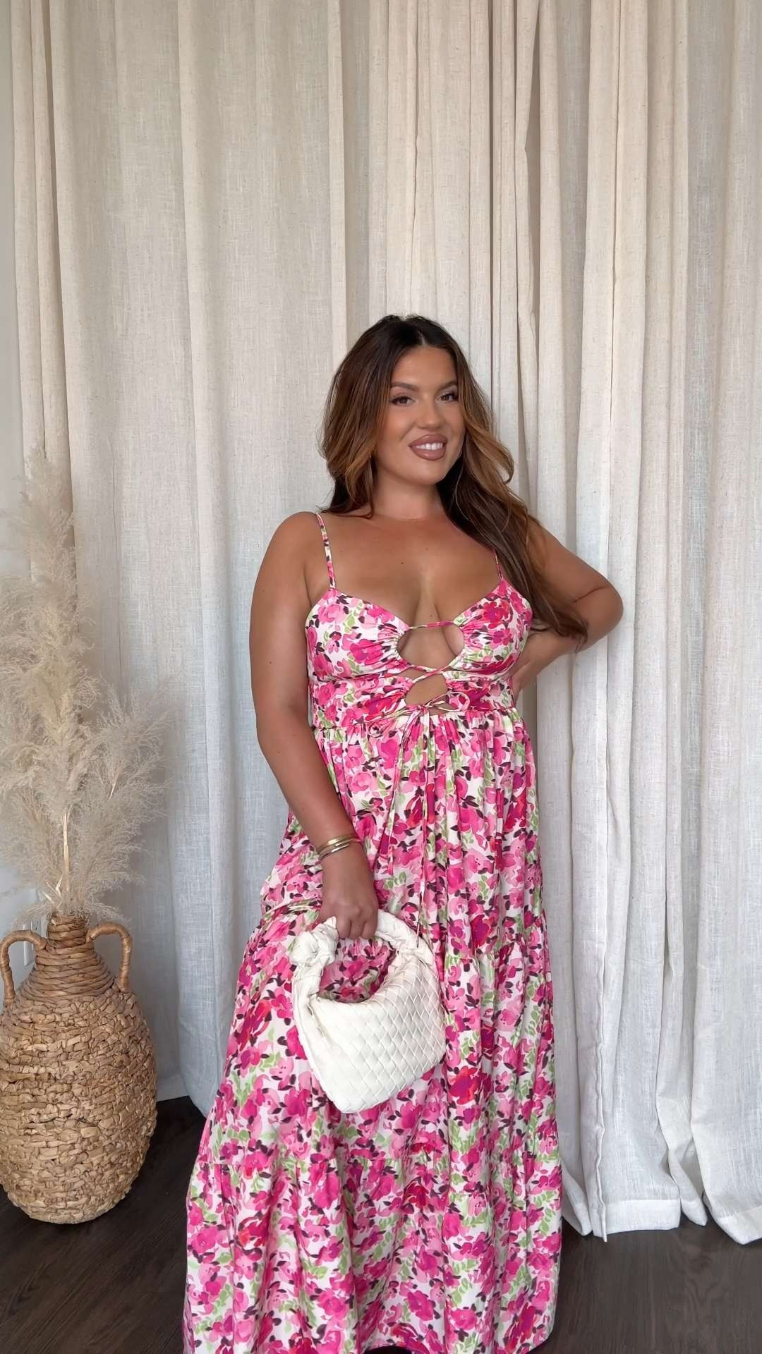 Floral Summer Maxi Dress! This dress is stunning (& a lil spicy!) Perfect for a summer date night, vacation, or brunch with the girls! The middle tie is adjustable to your chest and can be worn more modestly as well! Also linked my purse and similar 

 #LTKMidsize