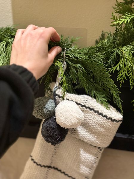 Quick and easy way to hang garland and Christmas stockings - Christmas decor ideas - holiday garland hack 

#LTKhome #LTKHoliday #LTKCyberWeek