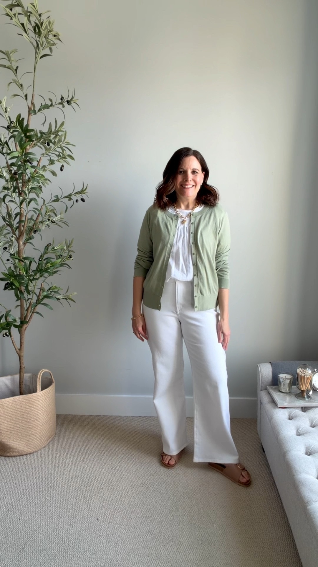 Easy spring outfit from LOFT: midrise wide leg white jeans (Mine measure 30”, but the site now lists them as 31”), wearing this white blouse in a small (tts) and this green cardigan in a large (size up- gifted). 

#LTKMidsize #LTKSaleAlert #LTKOver40