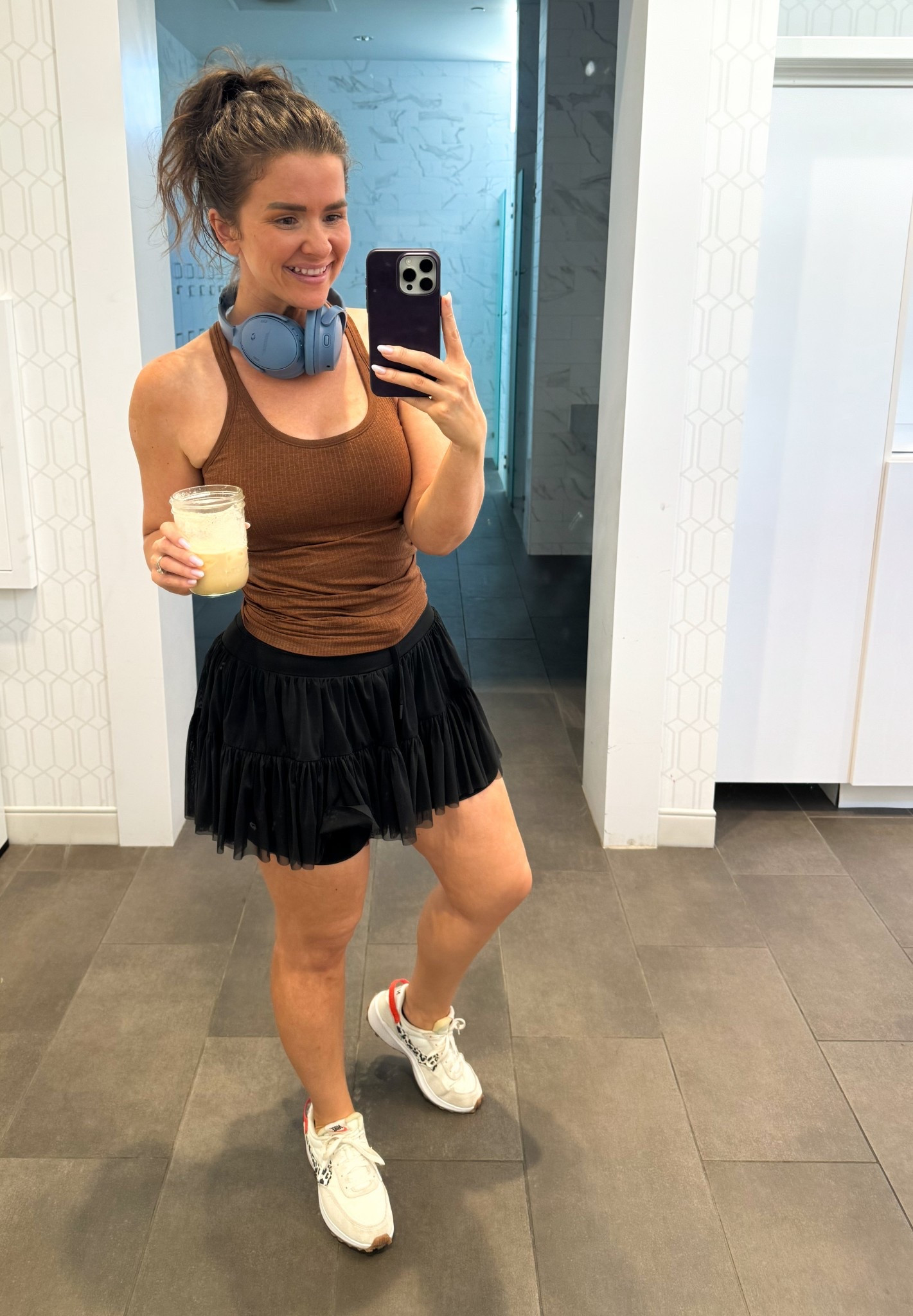 Post-workout glow ✨ fueled by endorphins and a ViCera protein iced coffee! Loving this sporty-chic combo for gym days—this ribbed tank is ultra-soft and breathable, and how fun is this layered mesh skort?! 🙌🏼 Also obsessed with these sneakers—they’re super comfy and add a cool touch to any active look. Linked everything for you below! 💪🏼🎧

#LTKfit #WorkoutStyle #AthleisureLook  #ActivewearStyle #FitnessFashion 


#LTKActive