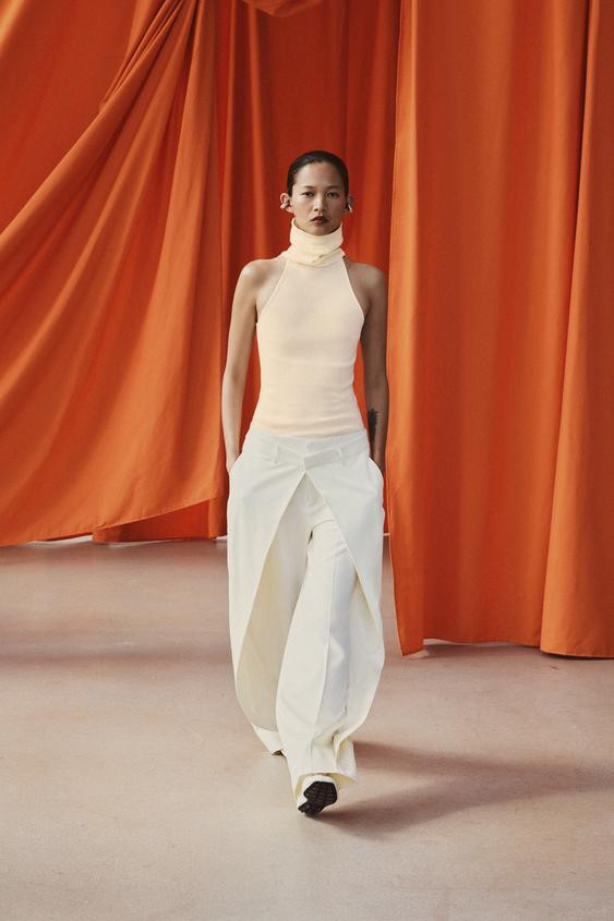 ZARA WOMAN COLLECTIONPants made from a lyocell-blend yarn. Mid-rise with belt loops. Side pockets... | Zara US