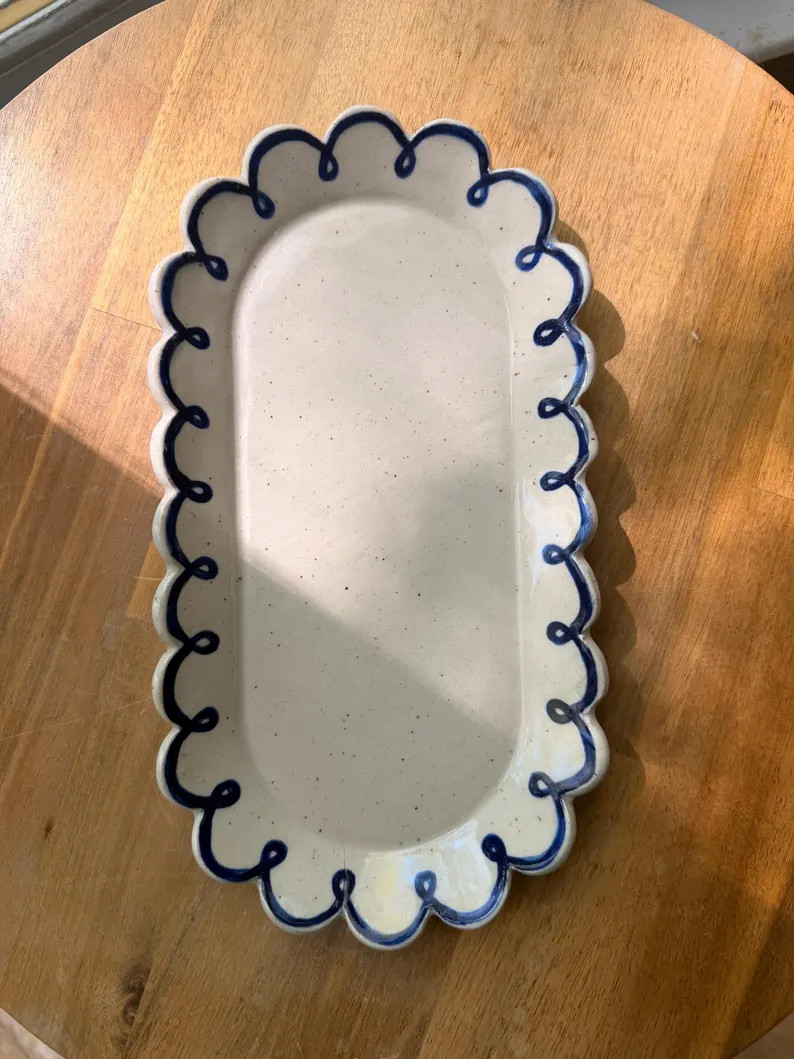 Handmade, scalloped platter with deep blue ribbon detail | Etsy (Global)
