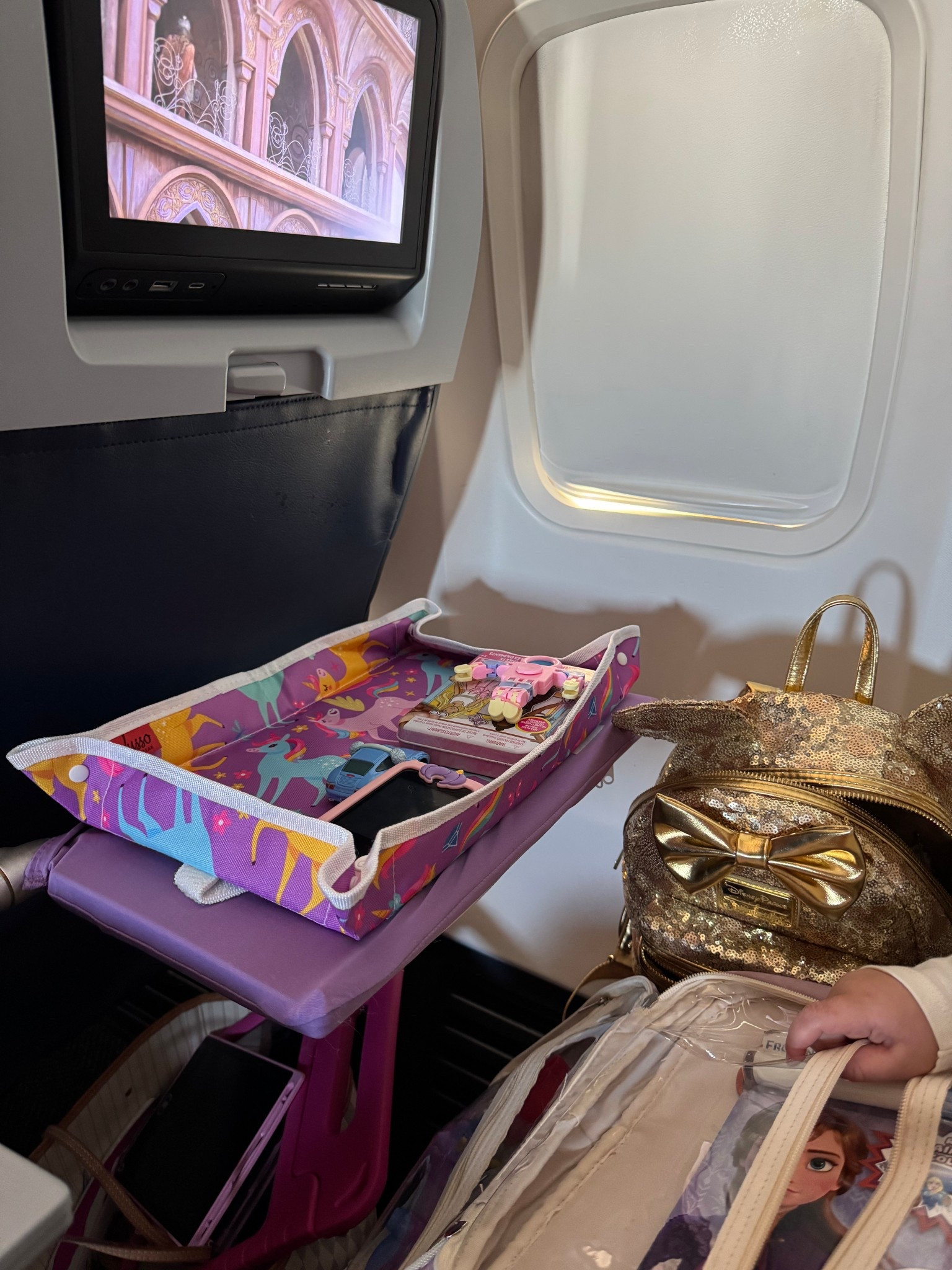 Love this non slip kids travel tray cover! Keeps toys from moving around during flight. Flight essentials. Travel hacks. Travel mom hacks. 

#LTKGiftGuide #LTKTravel #LTKKids