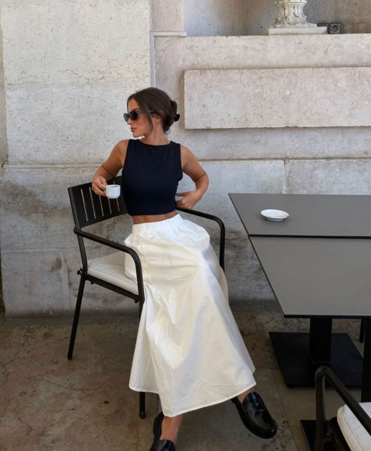 This chic summer outfit pairs a black sleeveless top with a flowing white maxi skirt for a timeless minimalist look.
The contrast of crisp white and classic black creates an effortlessly elegant outfit perfect for coffee dates, warm weather styling, and elevated everyday dressing. 

 #LTKSpringSale #LTKootd