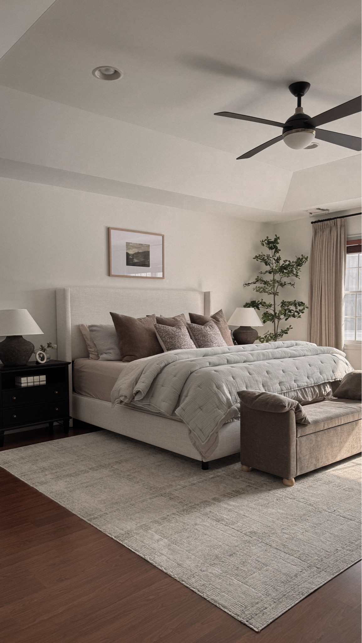 Bedroom rug, bedding, bed frame, bedroom nightstand, bed bench, bedroom curtains, nightstand lamp, nightstand decor, throw pillows, ceiling fan, artwork above bed, charging nightstands, olive tree

#LTKHome