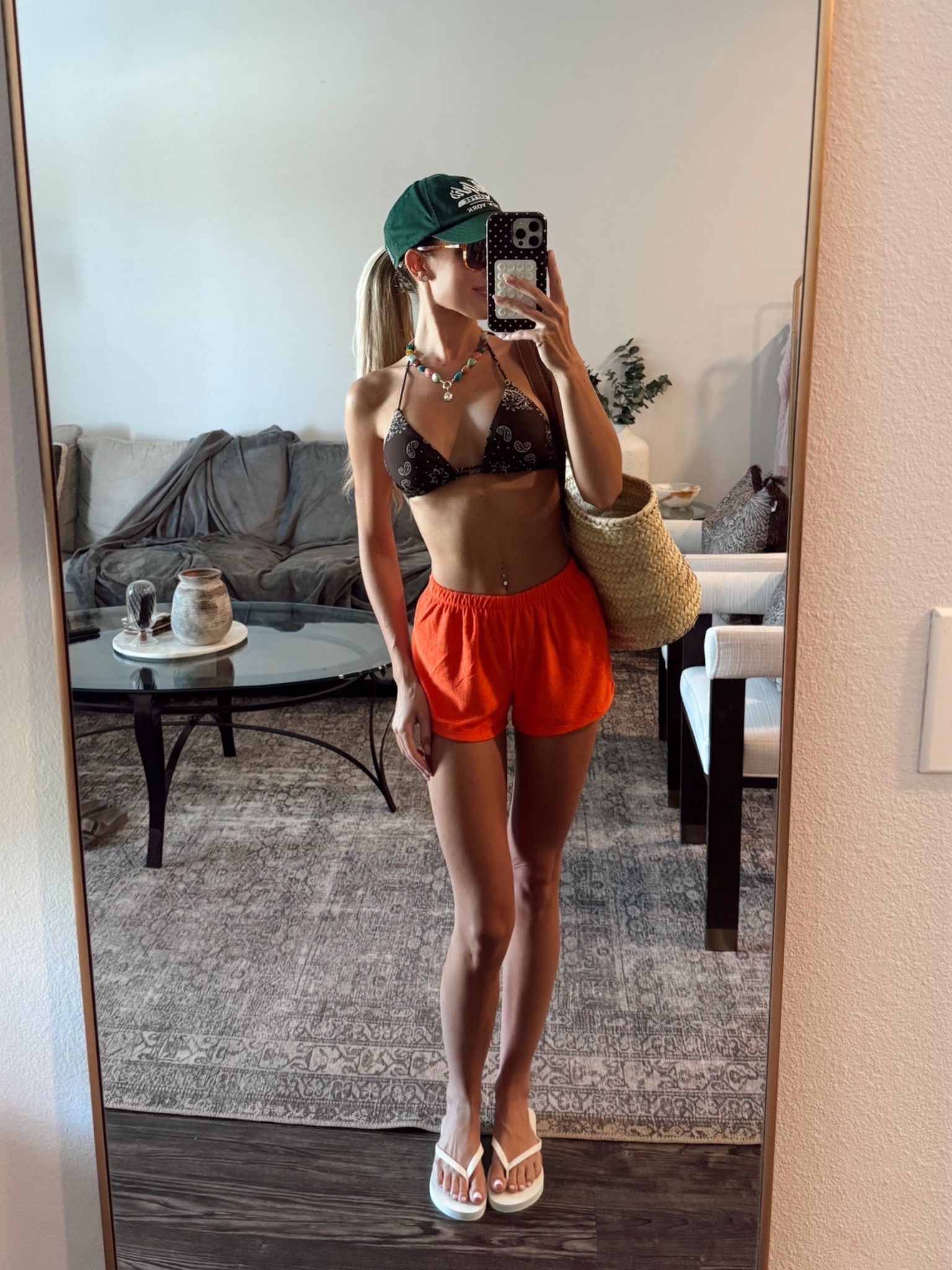 In my mismatch era 😂 but a few cute summer pieces I’m loving: these terry shorts, this bikini, beaded necklace

Pool day outfit. Terrycloth shorts. Flip flops. Target swimsuit. Summer.