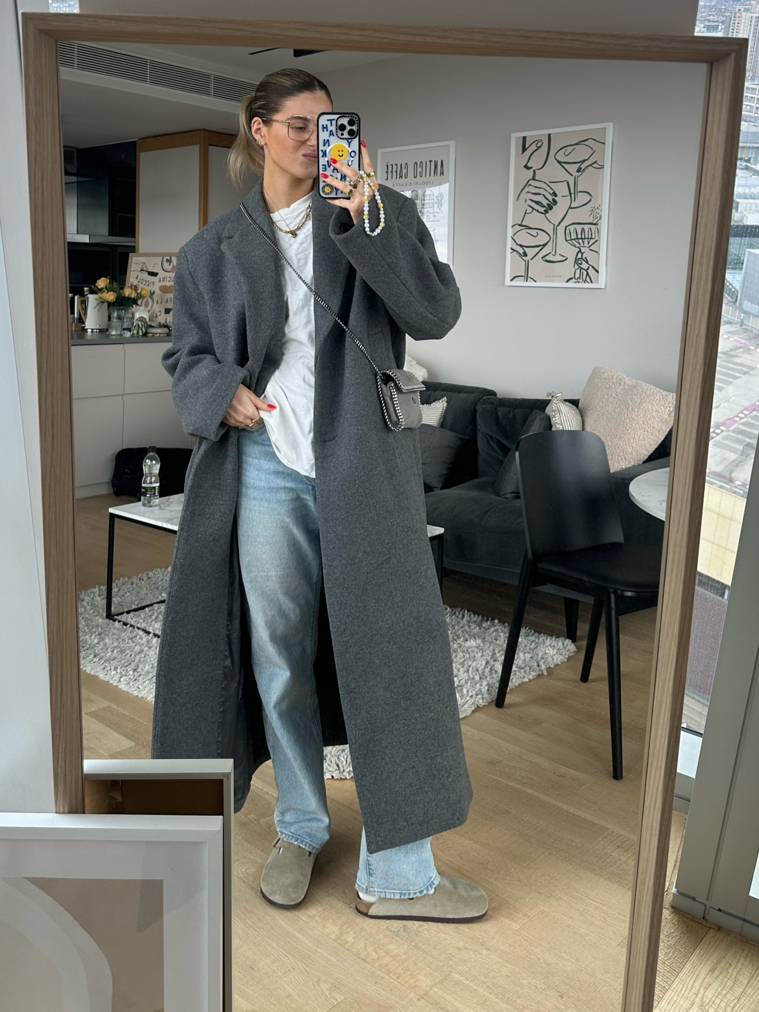 grey coat, white oversized tee, blue mid rise jeans, grey bag, birkestocks

#LTKSeasonal #LTKstyletip #LTKshoecrush