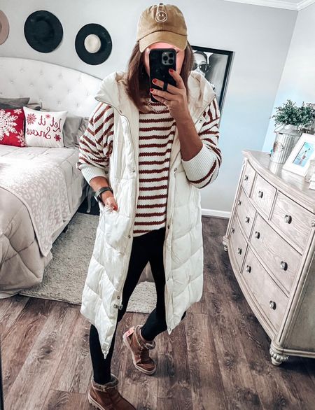 Long puffer vest is the top seller from Amazon, fits tts comes in more colors. Striped oversized sweater, black joggers, sketchers fuzzy boots and smiley cap

Casual weekend outfit, winter outfit, joggers outfit, amazon fashion, Amazon finds, winter boots, gift ideas, gift guide, holiday, Christmas, everyday outfit 

#LTKsalealert #LTKunder50 #LTKSeasonal