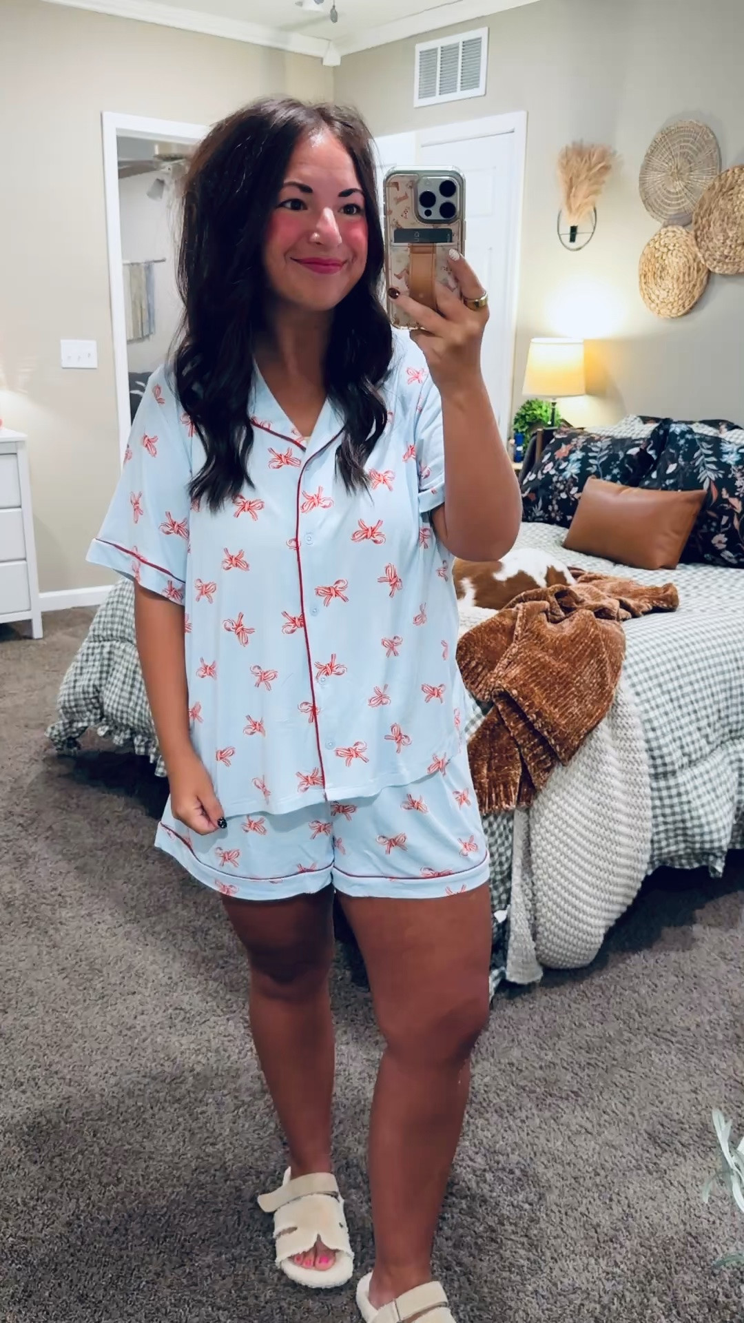 These Old Navy pajamas are just too cute! 🎀 Loving the red bow print on light blue with matching red trim. Such a sweet little set for slow mornings & cozy nights at home! ❤️

slippers: sold out, but linking similar options below!
pajama set: fits true to size // wearing a large 

 #LTKMidsize