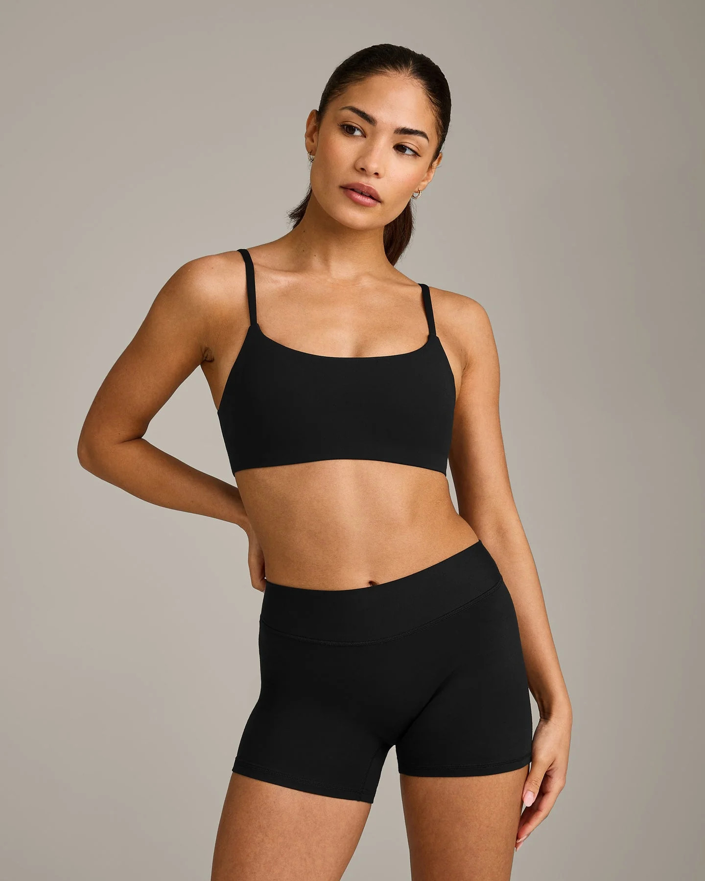SoftMotion\u2122 Strappy Sports Bra with Gray Logo | Black | Oner Active (UK / US)