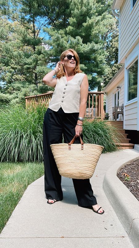 Walking into the week styling this chic linen vest with a pair of wide black pants. This effortless work style outfit is perfect for transitioning into fall 🍂 
Are you ready for fall? 

#LTKunder100 #LTKunder50 #LTKSeasonal