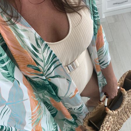 Easy neutral swimsuit and a pop ov color with my cover up.! My beach bag is back in stock but don’t wait too long!

#LTKFindsUnder50 #LTKOver40 #LTKSwim