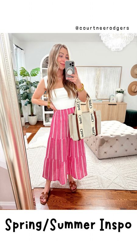 Claiming this my favorite find of Spring + Summer! 🩷 This gauzy striped pink skirt is soooo cute for weekends to vacations! 🫶🏻🌴☀️ I have a feeling this will sell fast!!! Runs TTS! Wearing size small in skirt + tank! 💁🏼‍♀️ You can shop everything via the link in my bio > Shop my Reels/IG Posts ➡️

Spring outfits, skirts, pink, marine layer, vacation outfit, spring fashion 

#LTKfindsunder100 #LTKstyletip #LTKsalealert
