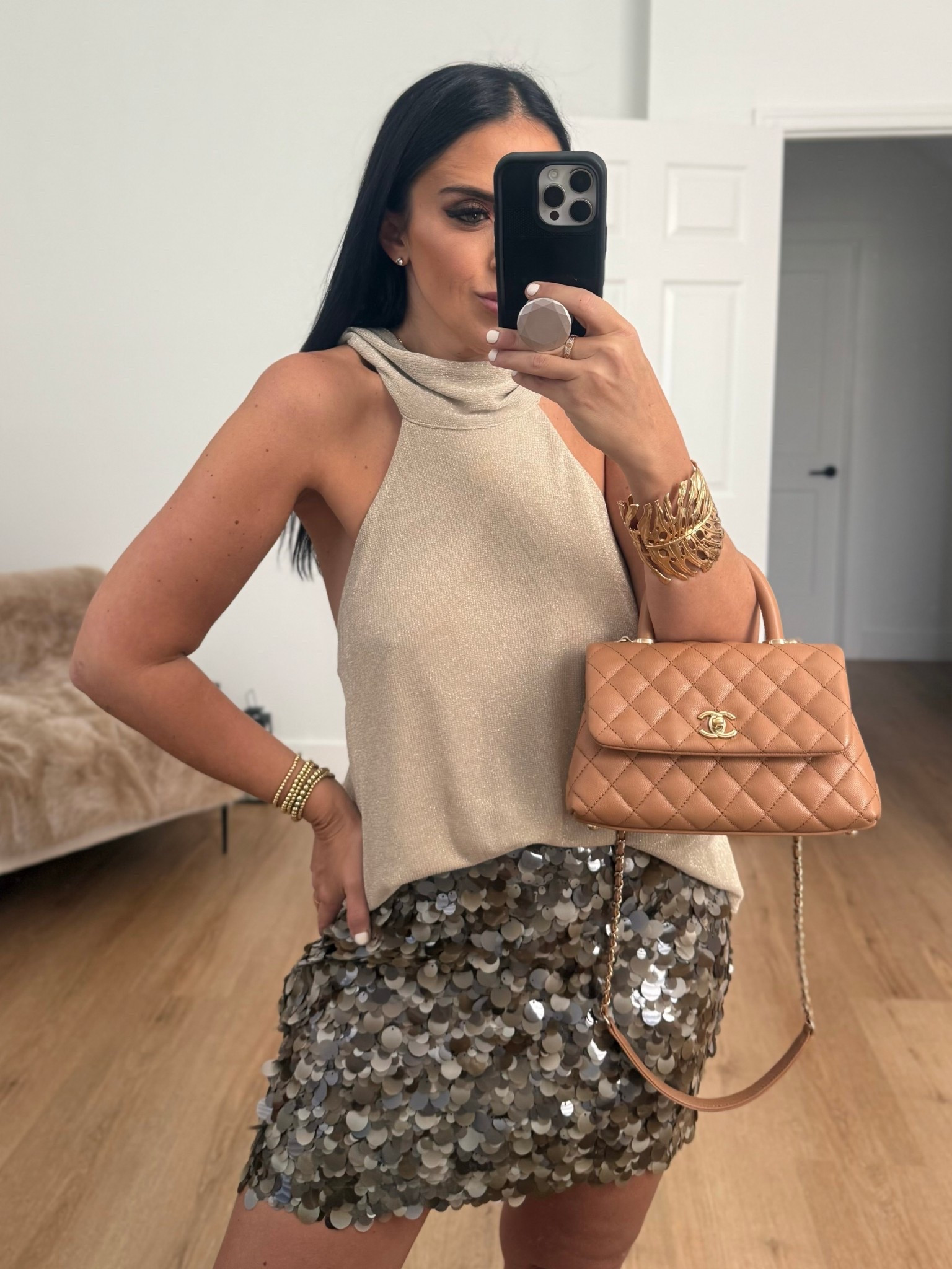 Metallic thread halter top, wearing size medium. Sequin mini skirt wearing size medium. 