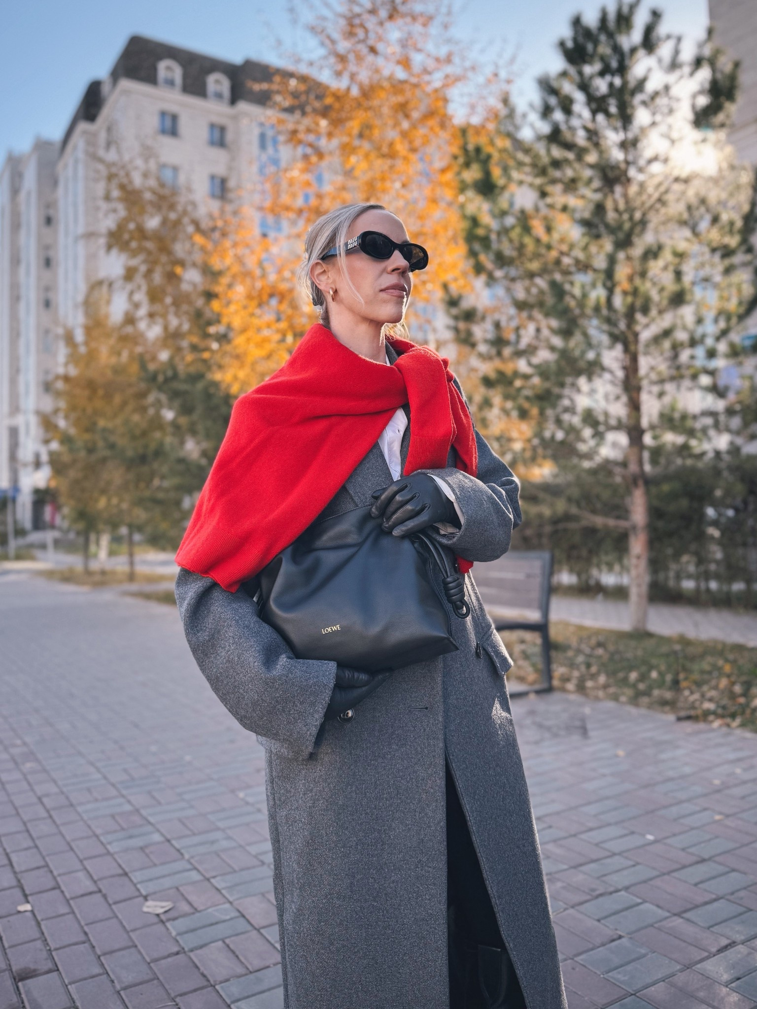 Red and gray fall outfit, bright red sweater, black leather gloves, Loewe Flamenco clutch, Miu Miu sunglasses 

#LTKItBag #LTKSeasonal #LTKHoliday